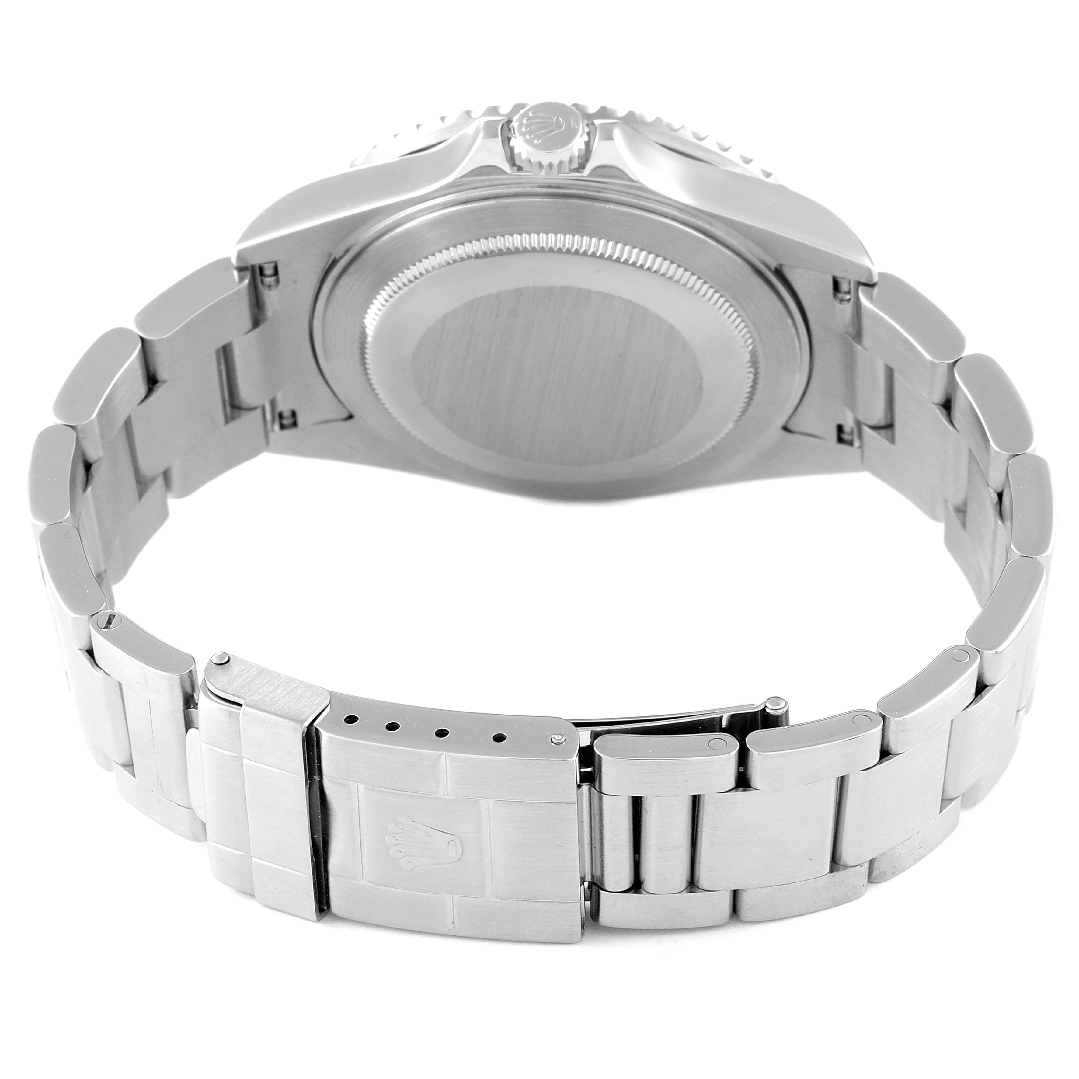 The image shows the back case and part of the bracelet of a Rolex GMT-Master 16710 Men
s Stainless Steel Black Dial 16710 Men
s Stainless Steel Black Dial watch.