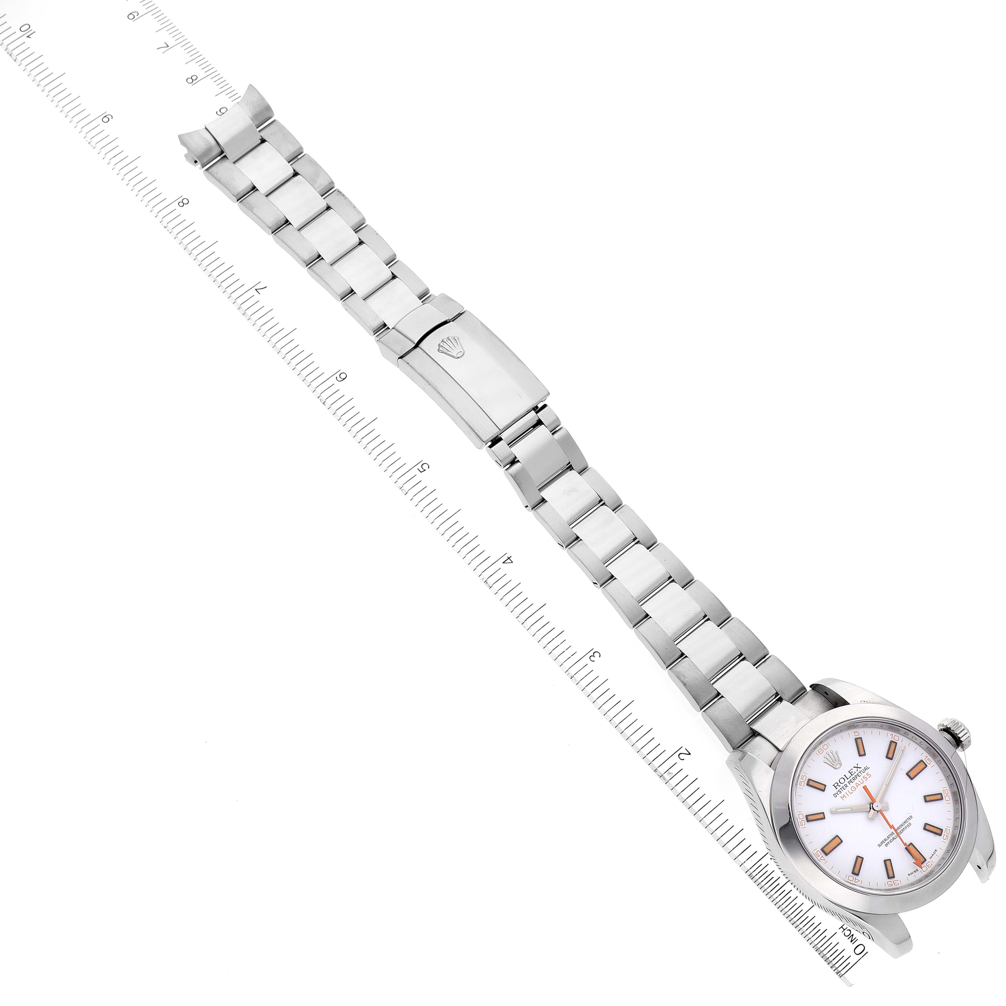 The Rolex Milgauss 116400 Men's Stainless Steel White Dial 116400 Men's Stainless Steel White Dial watch is shown from a top-down angle, highlighting the full bracelet, clasp, and face.