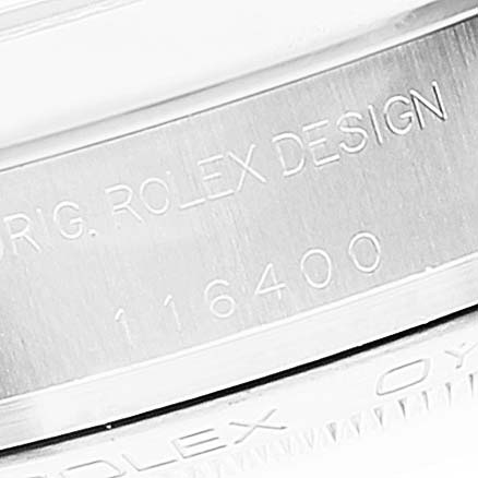 This image shows a close-up of the case back of a Rolex Milgauss 116400 Men's Stainless Steel White Dial 116400 Men's Stainless Steel White Dial watch, highlighting the engraved model number "116400" and "ORIG. ROLEX DESIGN".