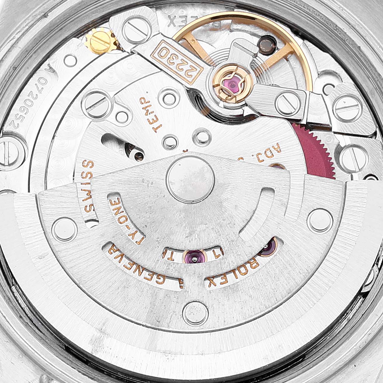 This image shows a close-up view of the movement mechanism inside a Rolex Oyster Perpetual 76183 Women's Steel and Gold (two tone) Grey Dial 76183 Women's Steel and Gold (two tone) Grey Dial watch.
