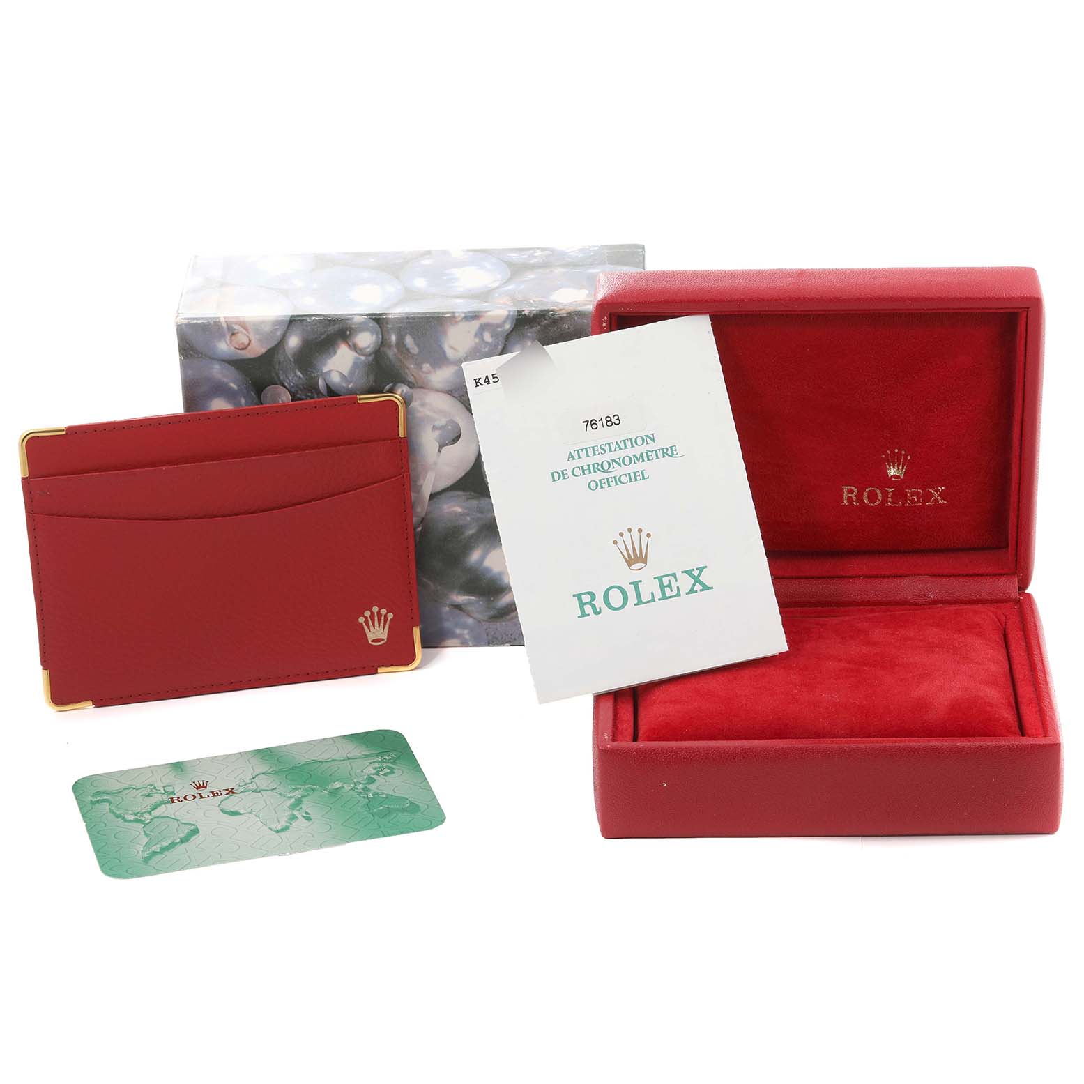 The image shows the packaging and accessories for a Rolex Oyster Perpetual 76183 Women's Steel and Gold (two tone) Grey Dial 76183 Women's Steel and Gold (two tone) Grey Dial, including a red box, warranty card, and documents.