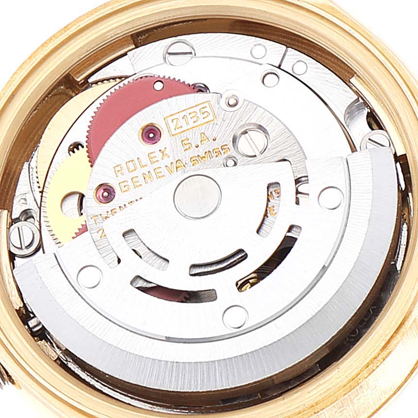 The image shows the internal movement mechanism of the Rolex President 69178 Women
s Yellow Gold Champagne Dial 69178 Women
s Yellow Gold Champagne Dial model watch from a close-up, rear angle view.