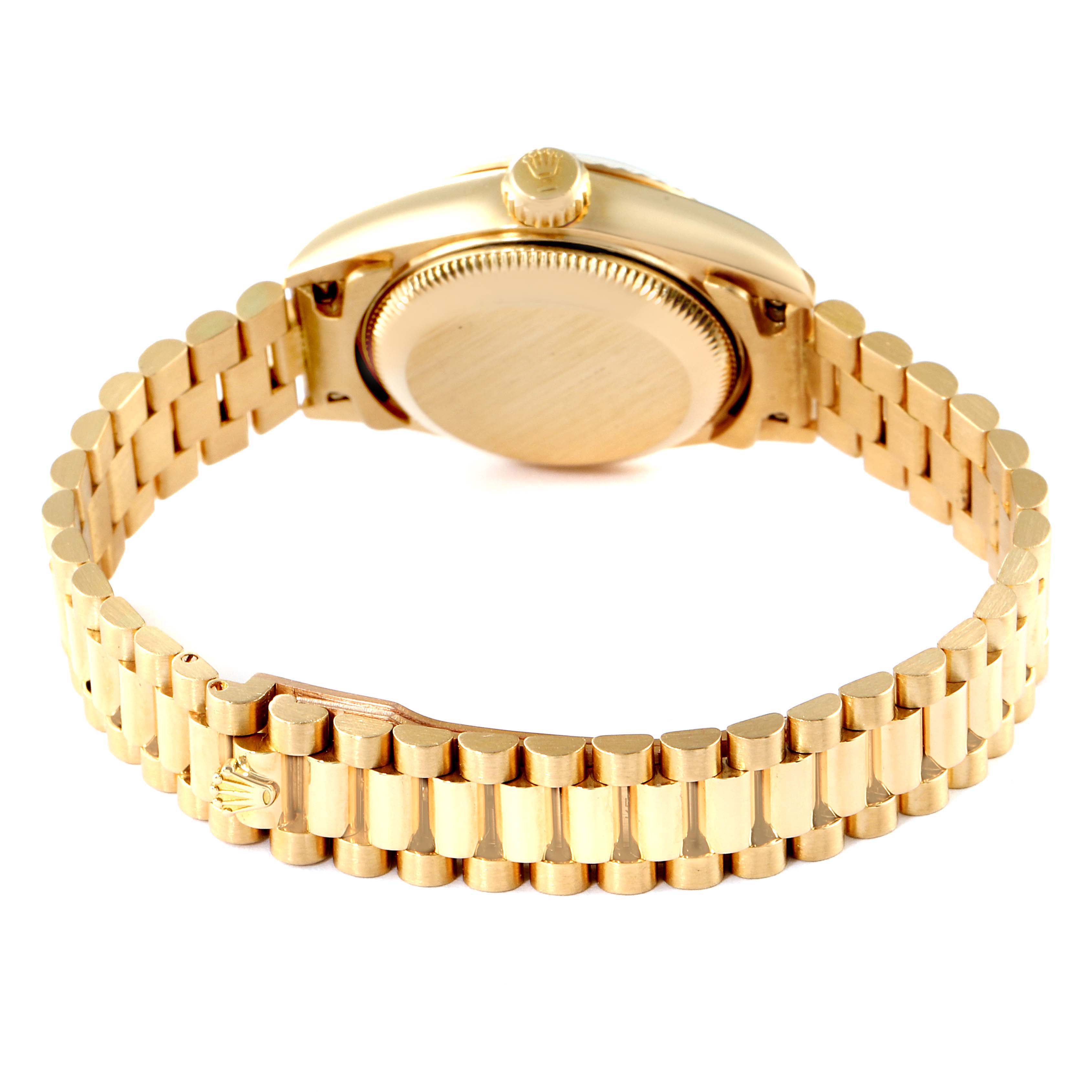 The image shows the back view of the Rolex President 69178 Women
s Yellow Gold Champagne Dial 69178 Women
s Yellow Gold Champagne Dial model watch, highlighting its case back, crown, and bracelet.