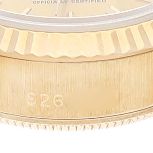 This image shows a close-up of the bezel and part of the case of a Rolex President 69178 Women
s Yellow Gold Champagne Dial 69178 Women
s Yellow Gold Champagne Dial model watch.