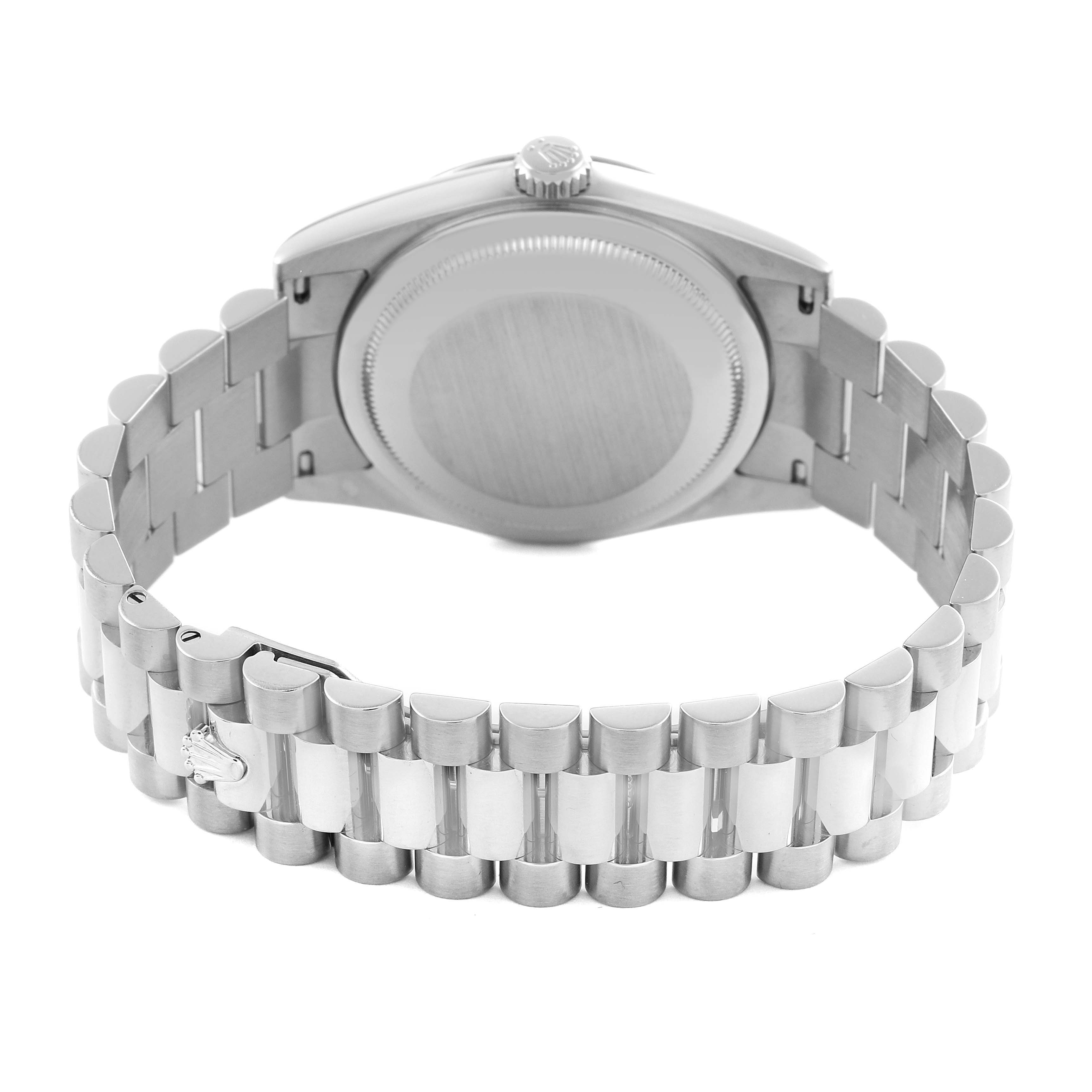 The image shows the back of a Rolex President 118239A Men
s White Gold Silver Dial 118239A Men
s White Gold Silver Dial model watch, highlighting the case back, bracelet, and crown from a rear angle.