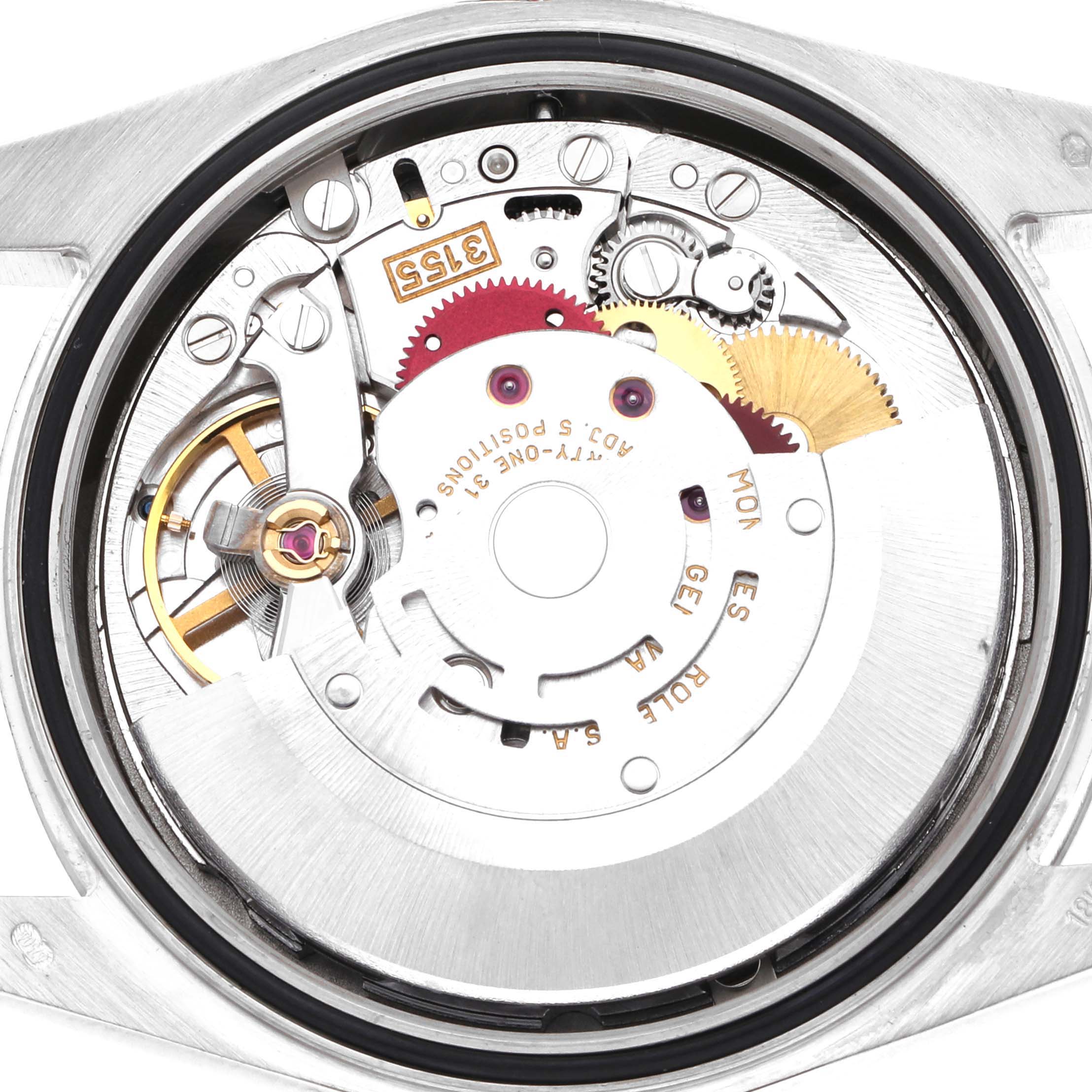 The image shows the movement mechanism of a Rolex President 118239A Men
s White Gold Silver Dial 118239A Men
s White Gold Silver Dial watch from a top-down angle, highlighting gears and components.