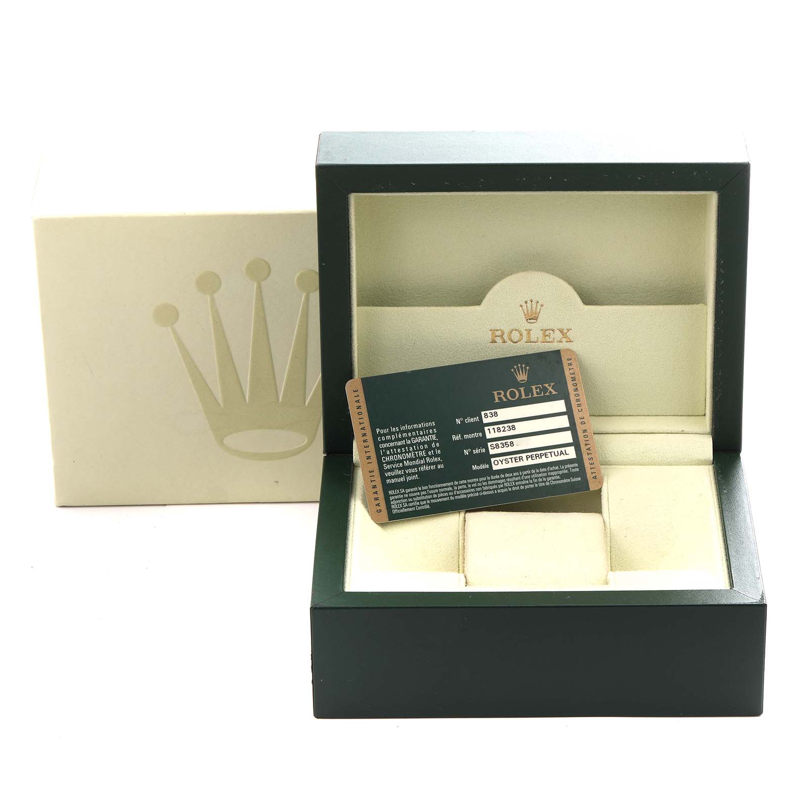 The image shows an open Rolex President 118238 Men's Yellow Gold Champagne Dial 118238 Men's Yellow Gold Champagne Dial model box with the warranty card placed inside.