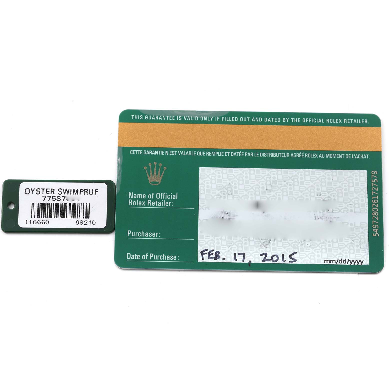 The image shows a top-down view of a Rolex Sea-Dweller 116660 Men's Stainless Steel Black Dial 116660 Men's Stainless Steel Black Dial warranty card and swimpruf tag.