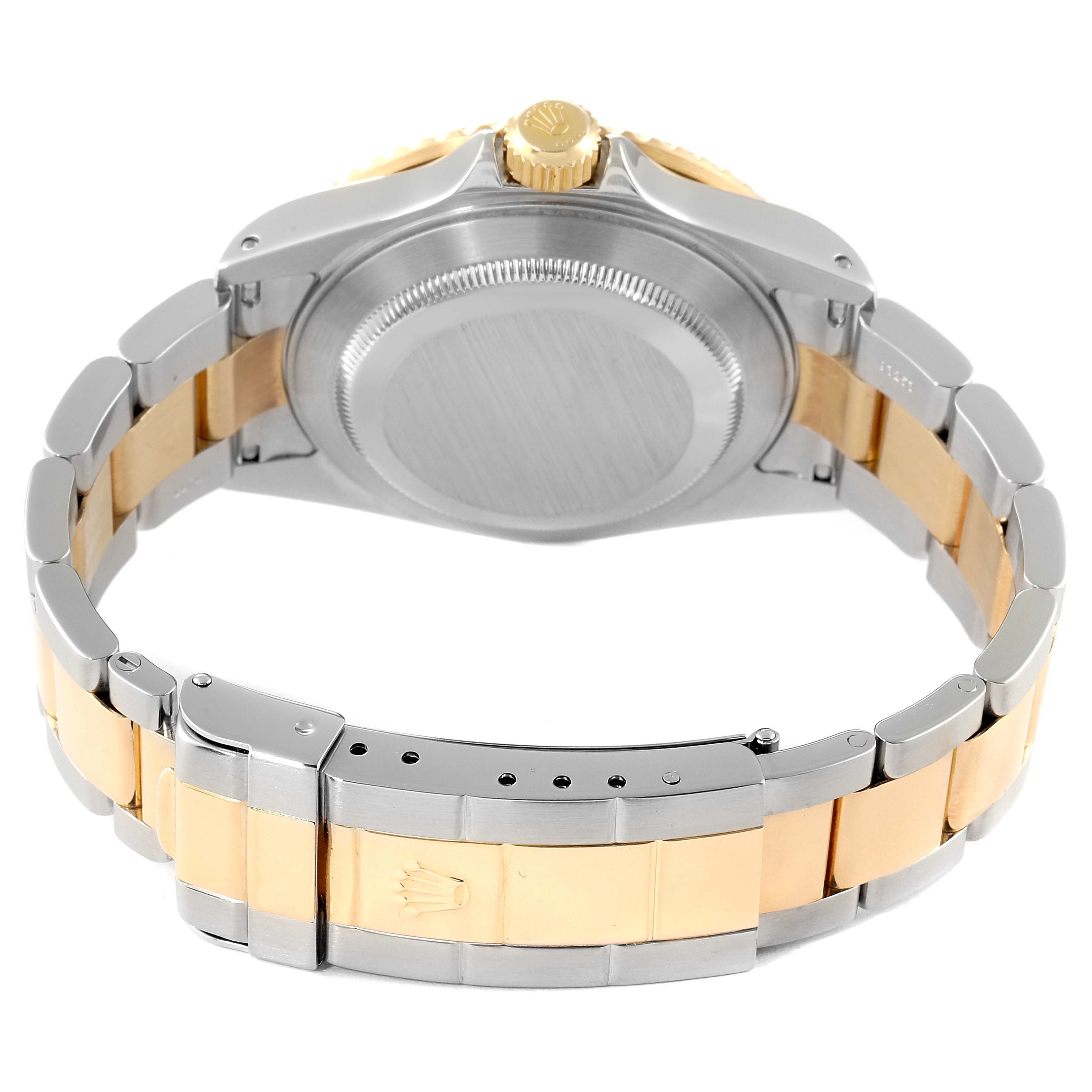 This image shows the back view of a Rolex Submariner 16613 Men
s Steel and Gold (two tone) Blue Dial 16613 Men
s Steel and Gold (two tone) Blue Dial watch highlighting its case back, crown, and metal bracelet.