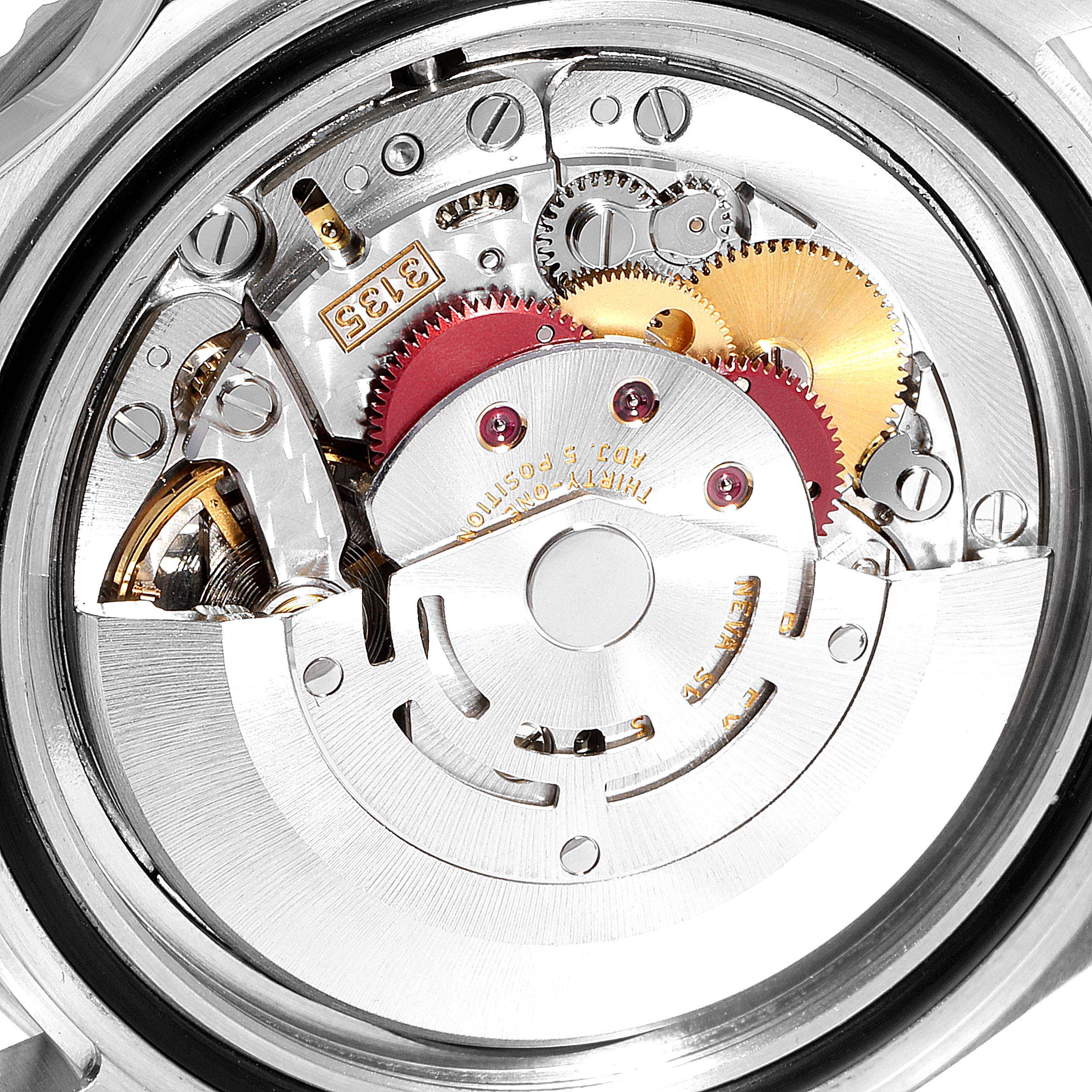 The image shows the internal movement mechanism of a Rolex Submariner 16610 Men
s Stainless Steel Black Dial 16610 Men
s Stainless Steel Black Dial watch viewed from the back.