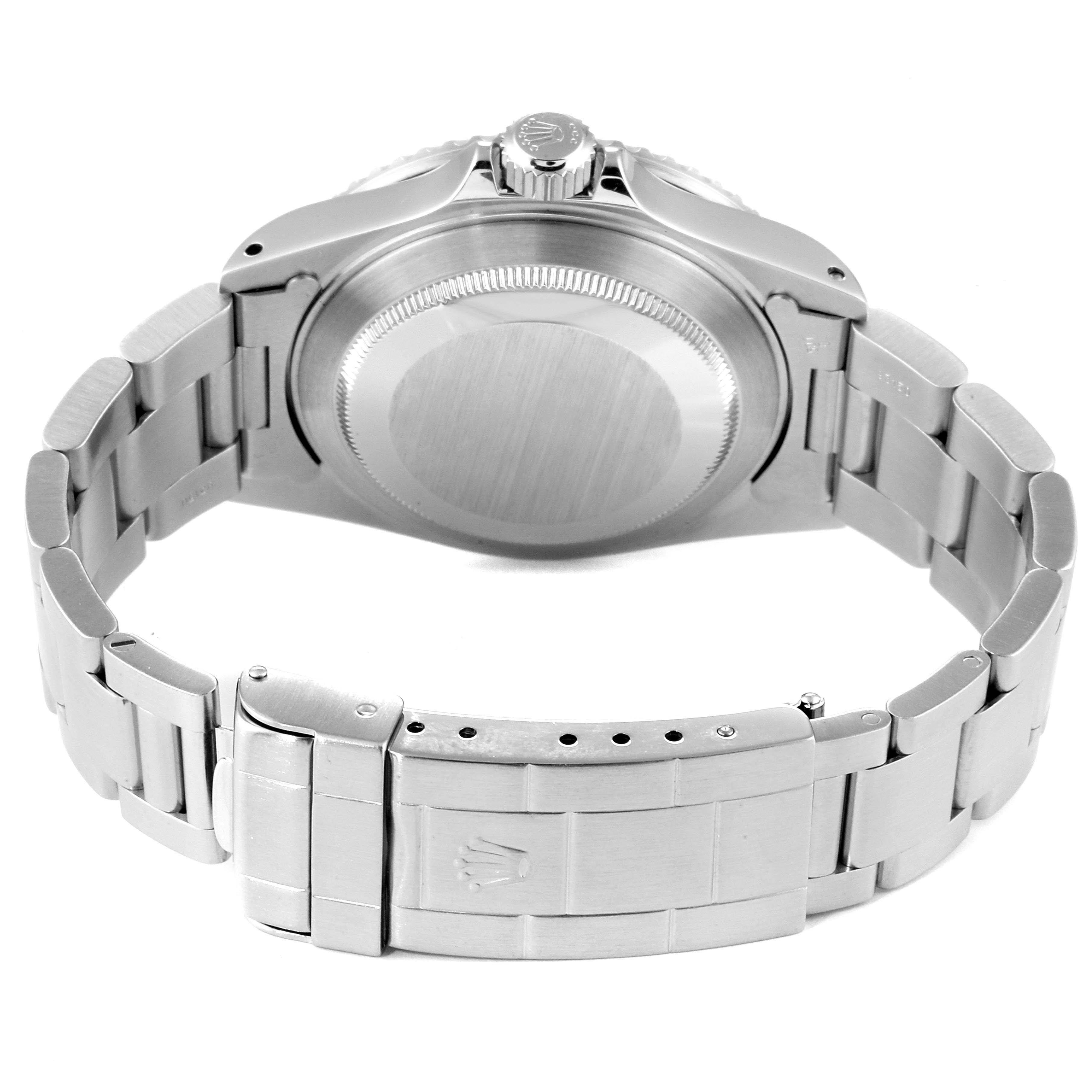 This image shows the back side and bracelet of a Rolex Submariner 16610 Men
s Stainless Steel Black Dial 16610 Men
s Stainless Steel Black Dial watch, focusing on the case back and clasp.