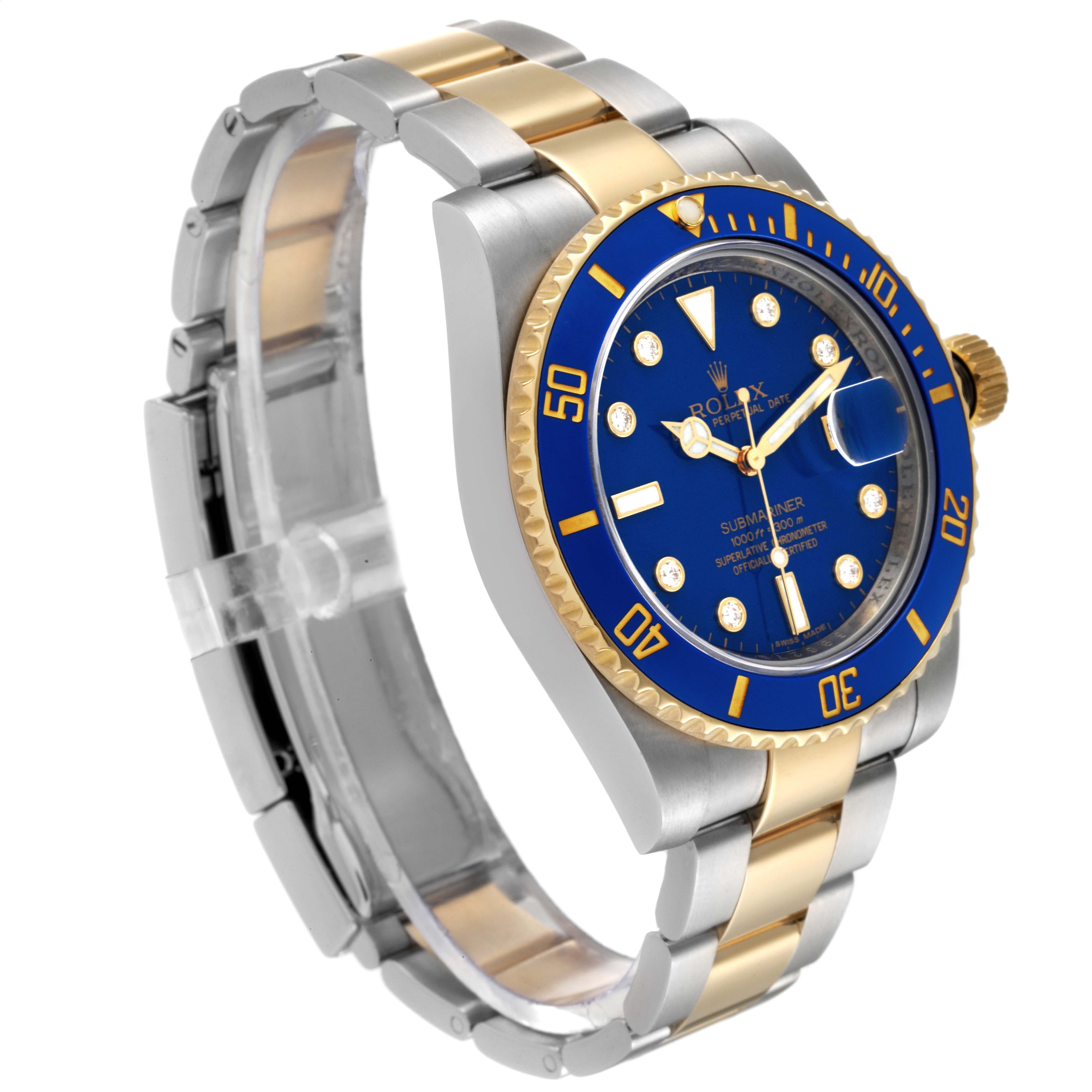 This Rolex Submariner 116613 Men's Steel and Gold (two tone) Blue Dial 116613 Men's Steel and Gold (two tone) Blue Dial watch is shown at a slight angle, displaying the band, bezel, crown, and part of the dial with its blue color.