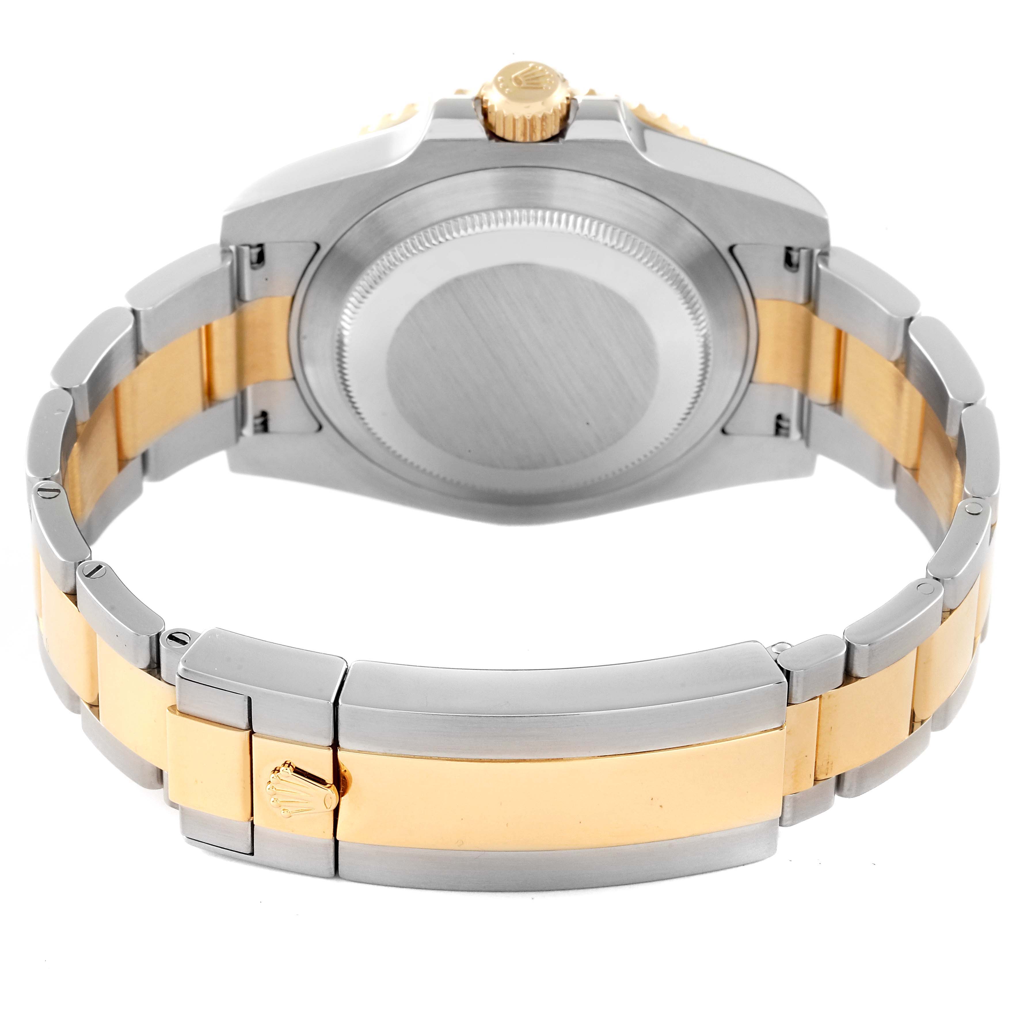 This image shows the back and clasp of a Rolex Submariner 116613 Men's Steel and Gold (two tone) Blue Dial 116613 Men's Steel and Gold (two tone) Blue Dial watch with a two-tone metal bracelet.