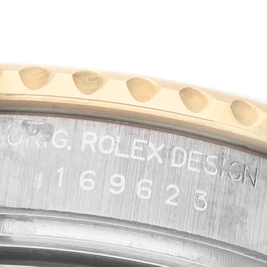 The image shows a close-up of the bezel and case side of the Rolex Yacht-Master 169623 Women's Stainless Steel Grey Dial, displaying part of its serial number engraving.