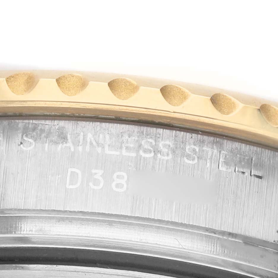 The image shows a close-up of the Rolex Yacht-Master 169623 Women's Stainless Steel Grey Dial's bezel edge with engraved text on the side.