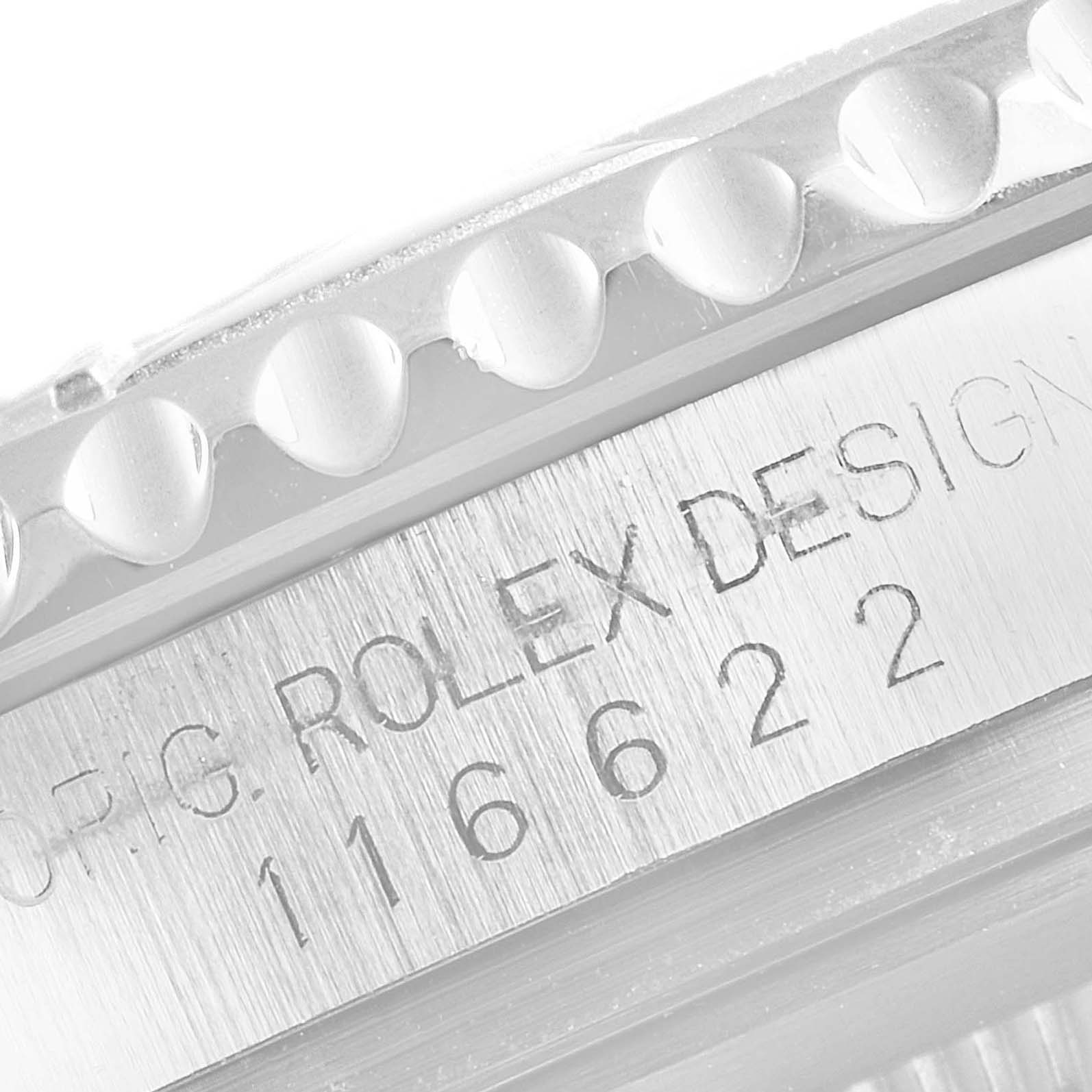 This close-up image shows the engraved serial and model numbers on the side of a Rolex Yacht-Master 116622 Men
s Stainless Steel Grey Dial 116622 Men
s Stainless Steel Grey Dial watch case.