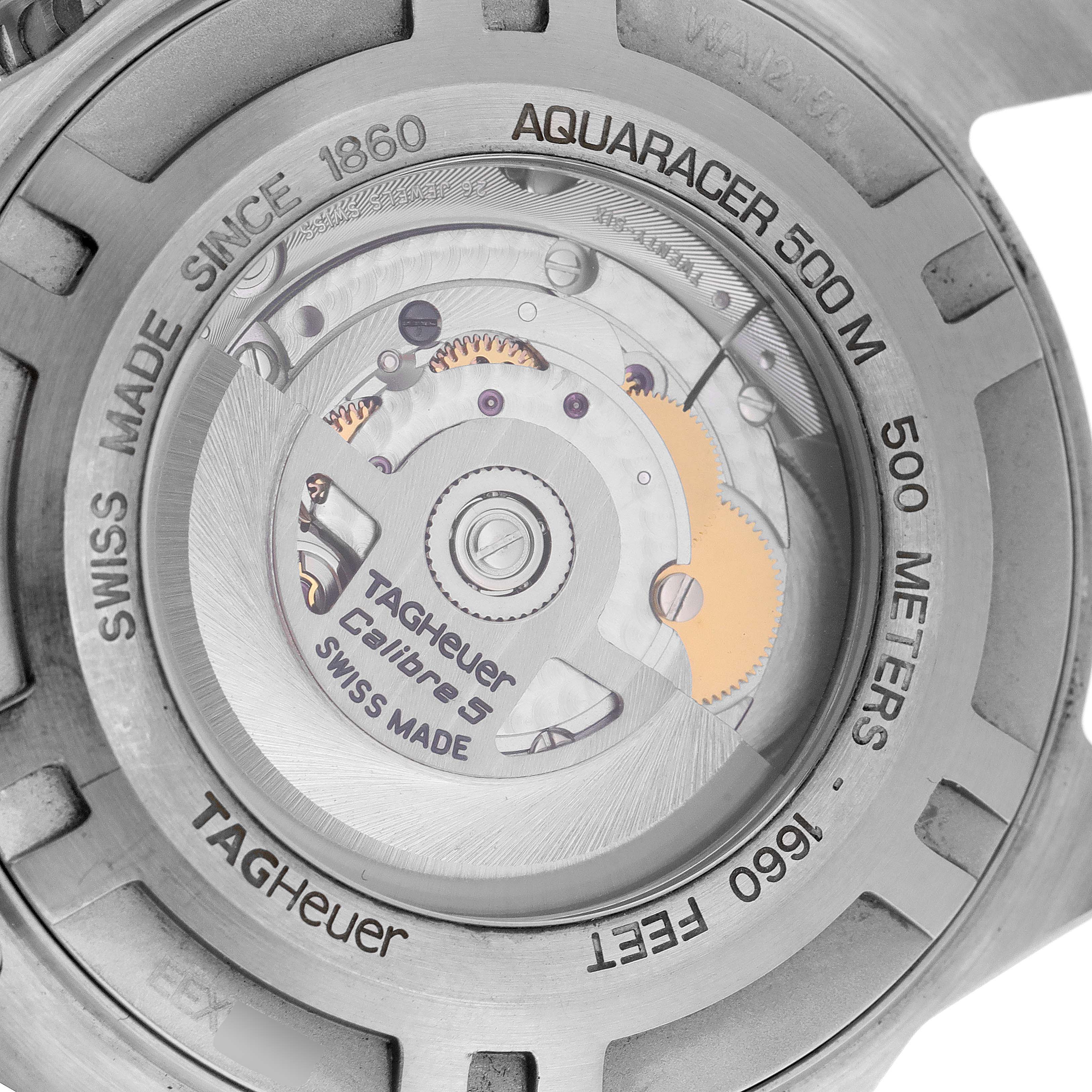 The image shows the back of a Tag Heuer Aquaracer WAJ2150.BA0870 Men's Stainless Steel Black Dial WAJ2150.BA0870 Men's Stainless Steel Black Dial watch, highlighting its Calibre 5 movement and water resistance details.