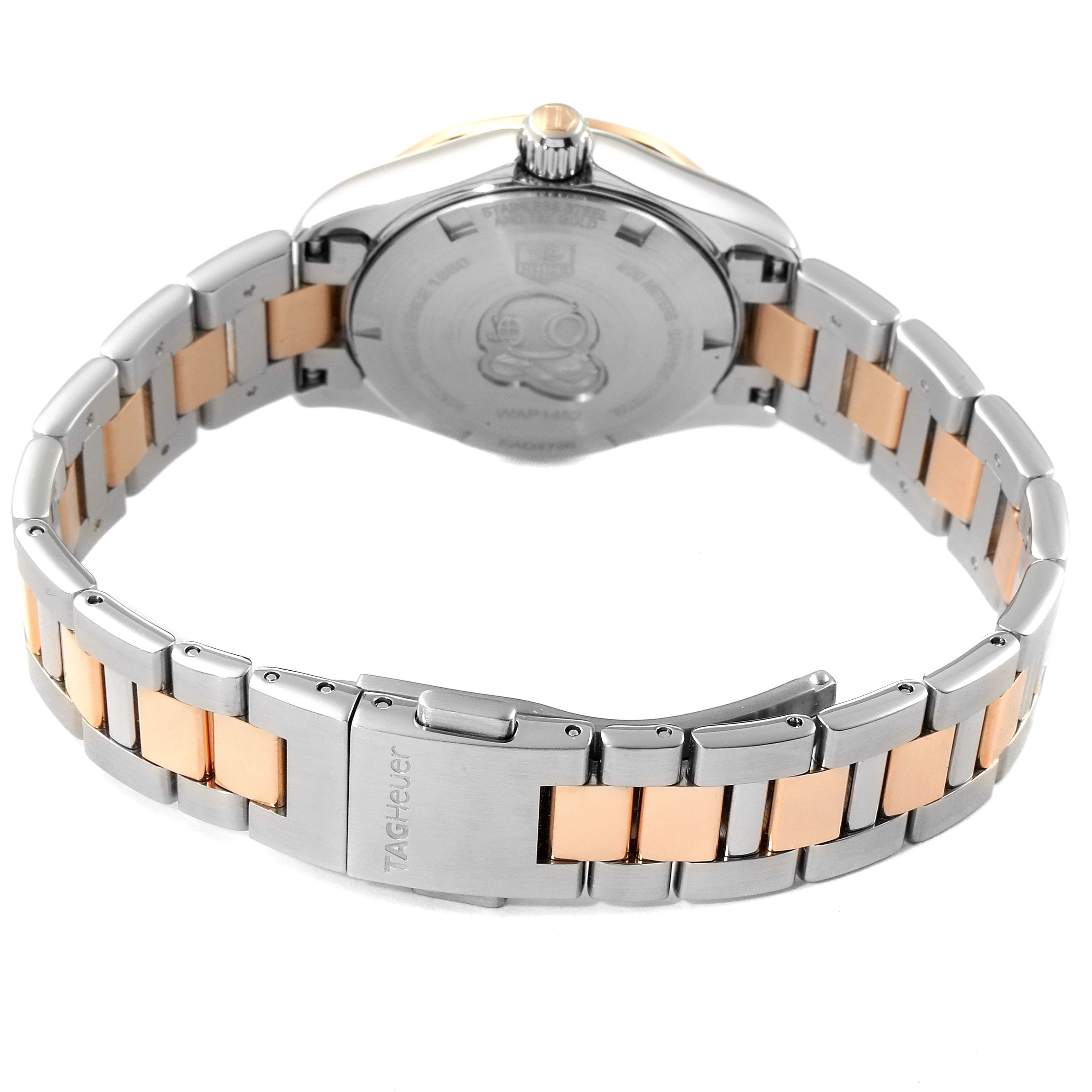 This image shows the back case and bracelet of the Tag Heuer Aquaracer WAP1452.BD0837 Women
s Steel and Gold (two tone) Mother of Pearl Dial WAP1452.BD0837 Women
s Steel and Gold (two tone) Mother of Pearl Dial watch from a rear angle.