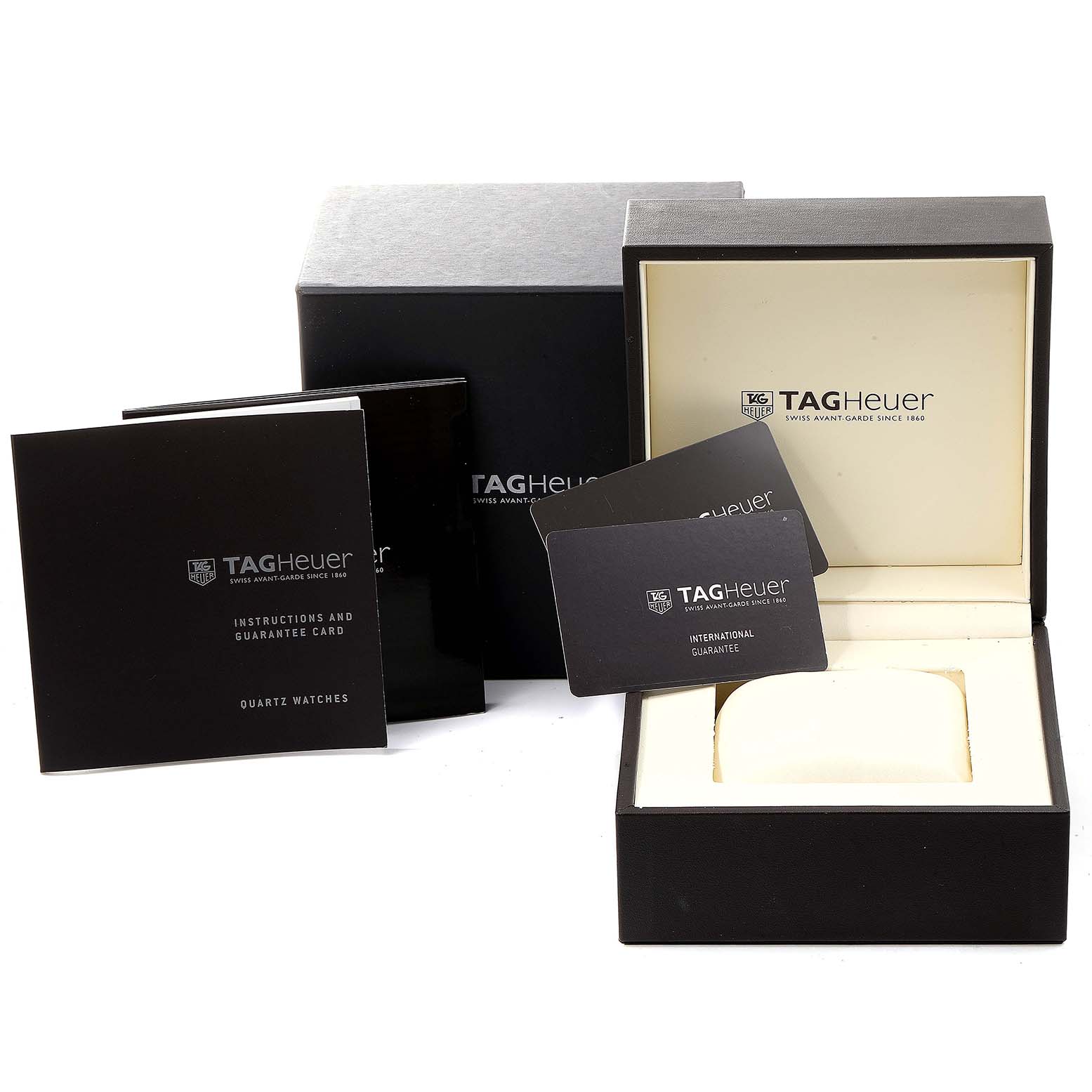 The image shows a Tag Heuer Aquaracer WAP1452.BD0837 Women
s Steel and Gold (two tone) Mother of Pearl Dial WAP1452.BD0837 Women
s Steel and Gold (two tone) Mother of Pearl Dial watch box, instruction manual, guarantee card, and packaging from a front angle.