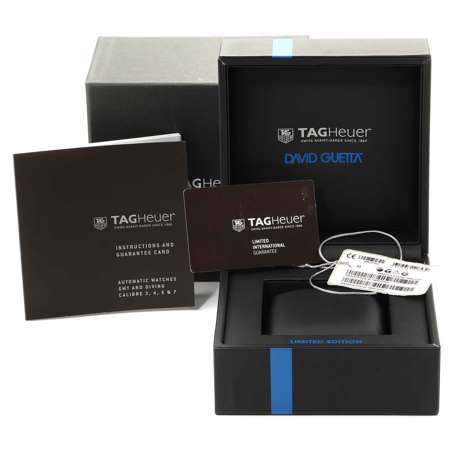 The image shows the box, instruction manual, guarantee card, and tags for the Tag Heuer Formula 1 WAZ201A.FC8195 Men's Titanium Black Dial WAZ201A.FC8195 Men's Titanium Black Dial David Guetta Limited Edition watch.