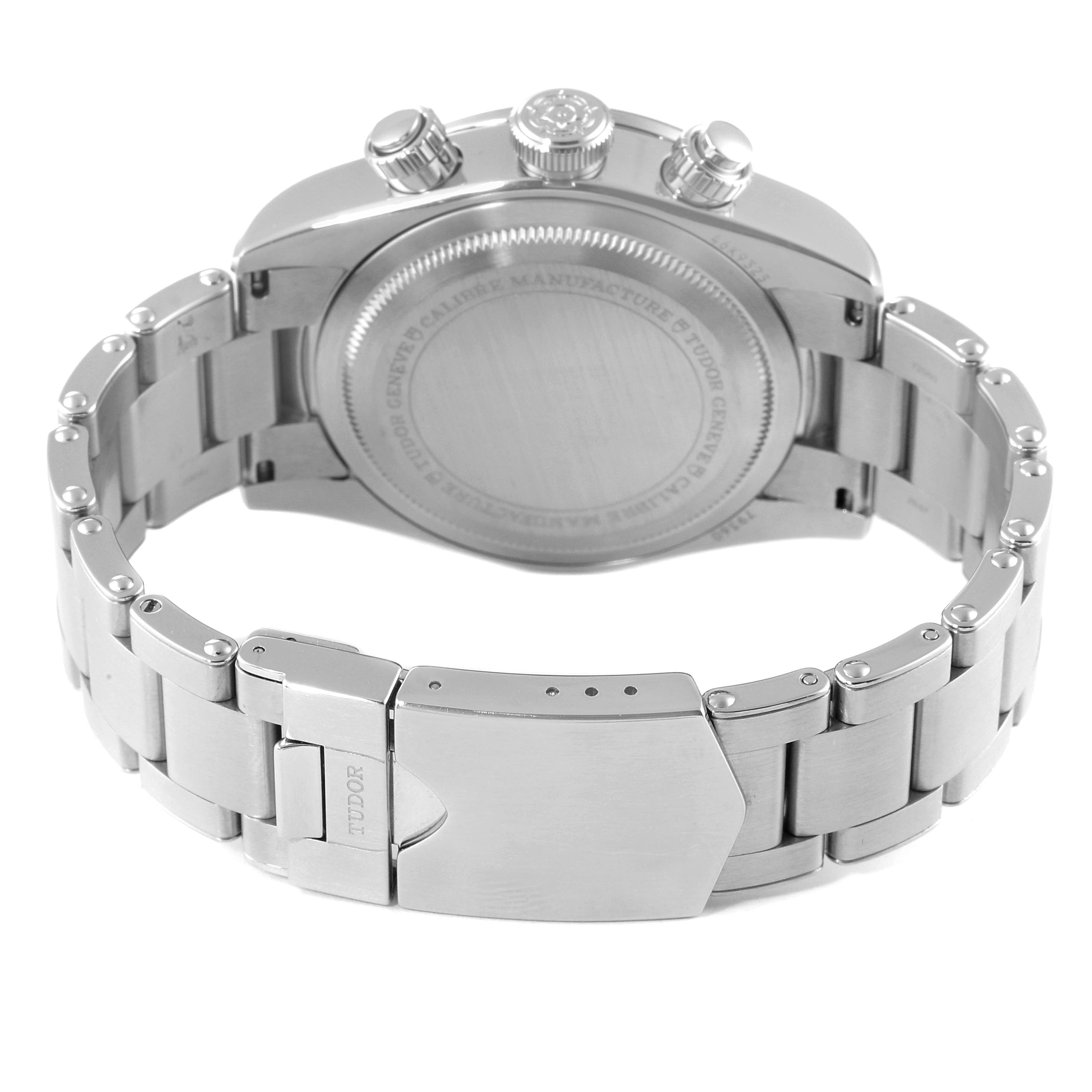 The image shows the backside and bracelet clasp of a Tudor Heritage Black Bay 79360N Men
s Stainless Steel Black Dial 79360N Men
s Stainless Steel Black Dial watch, including its case back and stainless steel bracelet.