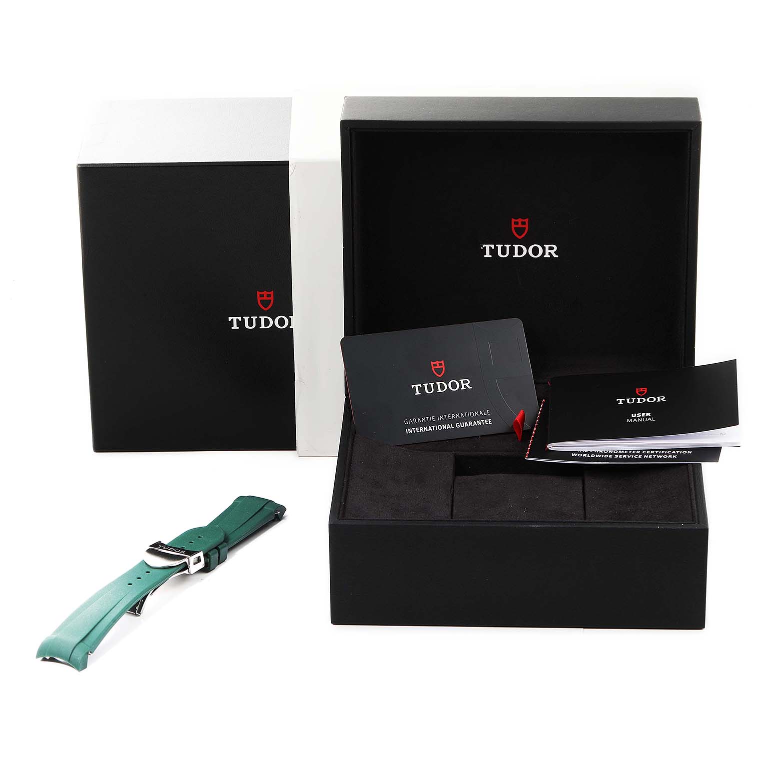 The image shows the packaging, a green strap, international guarantee card, and user manual for the Tudor Heritage Black Bay 79360N Men
s Stainless Steel Black Dial 79360N Men
s Stainless Steel Black Dial watch.