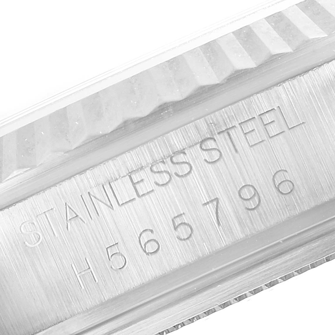 This image shows a close-up of the stainless steel casing and model number engraving (H565796) on a Tudor Prince 76214 Men
s Stainless Steel Black Dial 76214 Men
s Stainless Steel Black Dial watch.