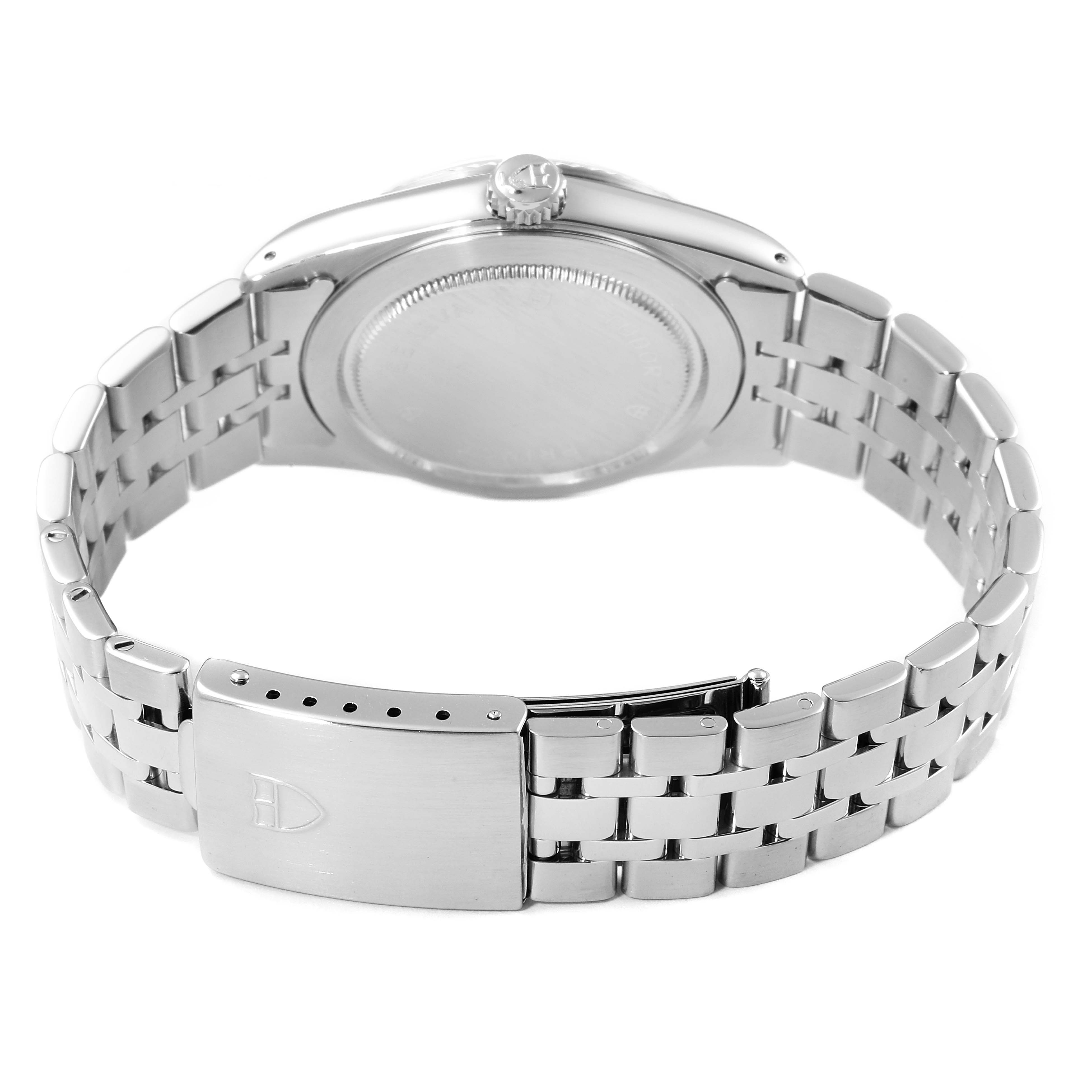 The image shows the back case and bracelet clasp of a Tudor Prince 76214 Men
s Stainless Steel Black Dial 76214 Men
s Stainless Steel Black Dial model watch, viewed from the rear.