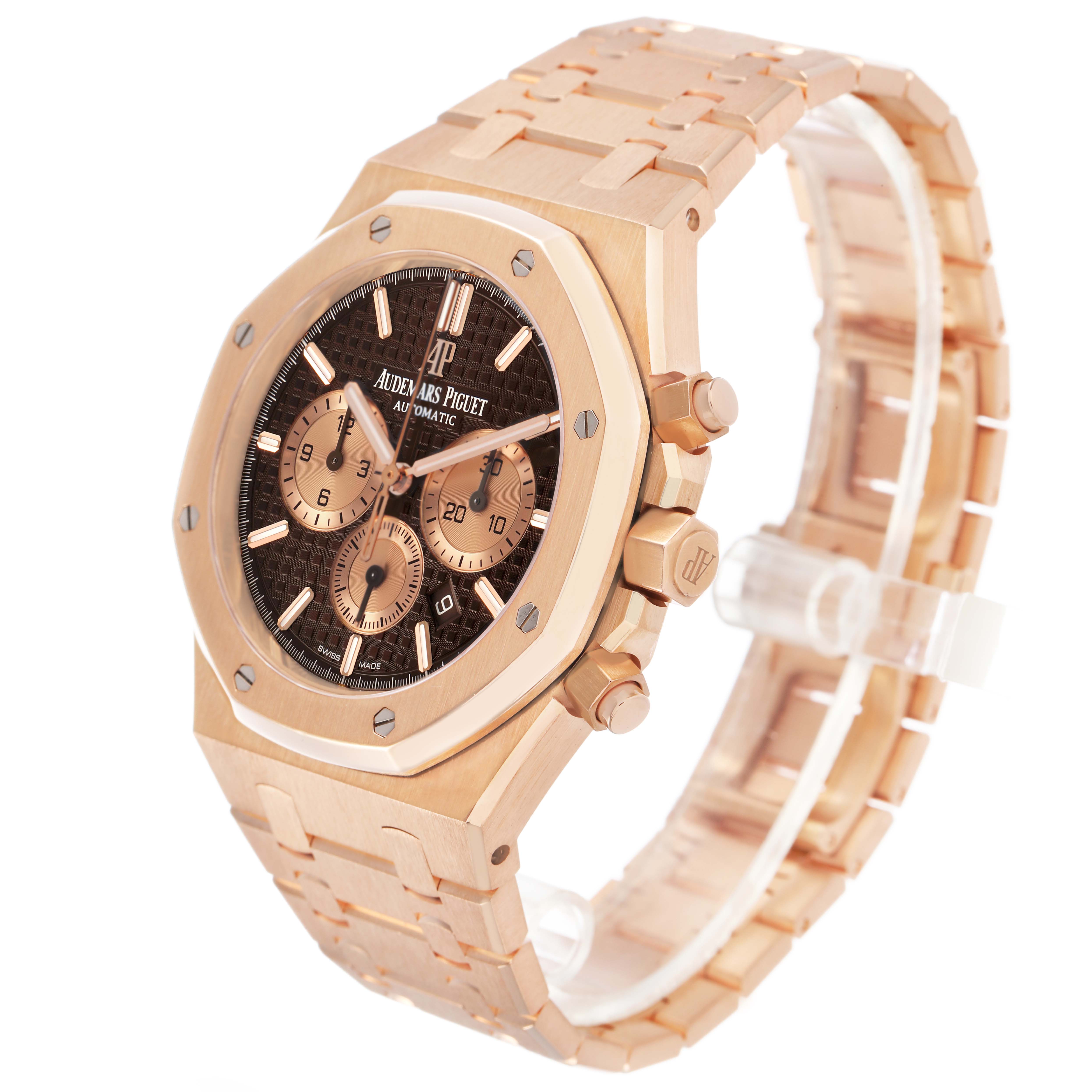 The image shows a side angle of the Royal Oak by Audemars Piguet, highlighting the bezel, dial, crown, and bracelet.