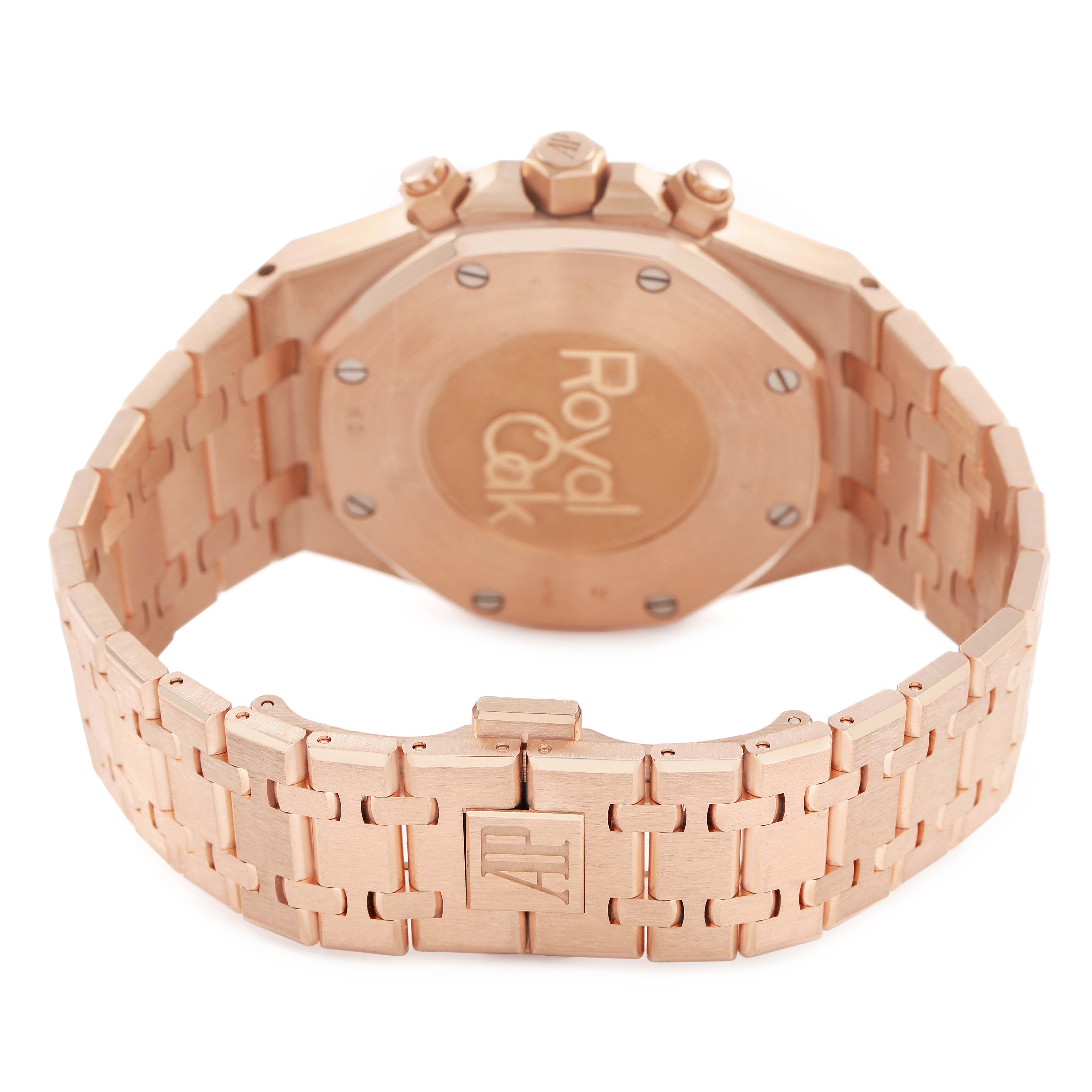 The image shows the back side of an Audemars Piguet Royal Oak 26331OR Men's Rose Gold Brown Dial watch, highlighting the case back and bracelet with clasp.