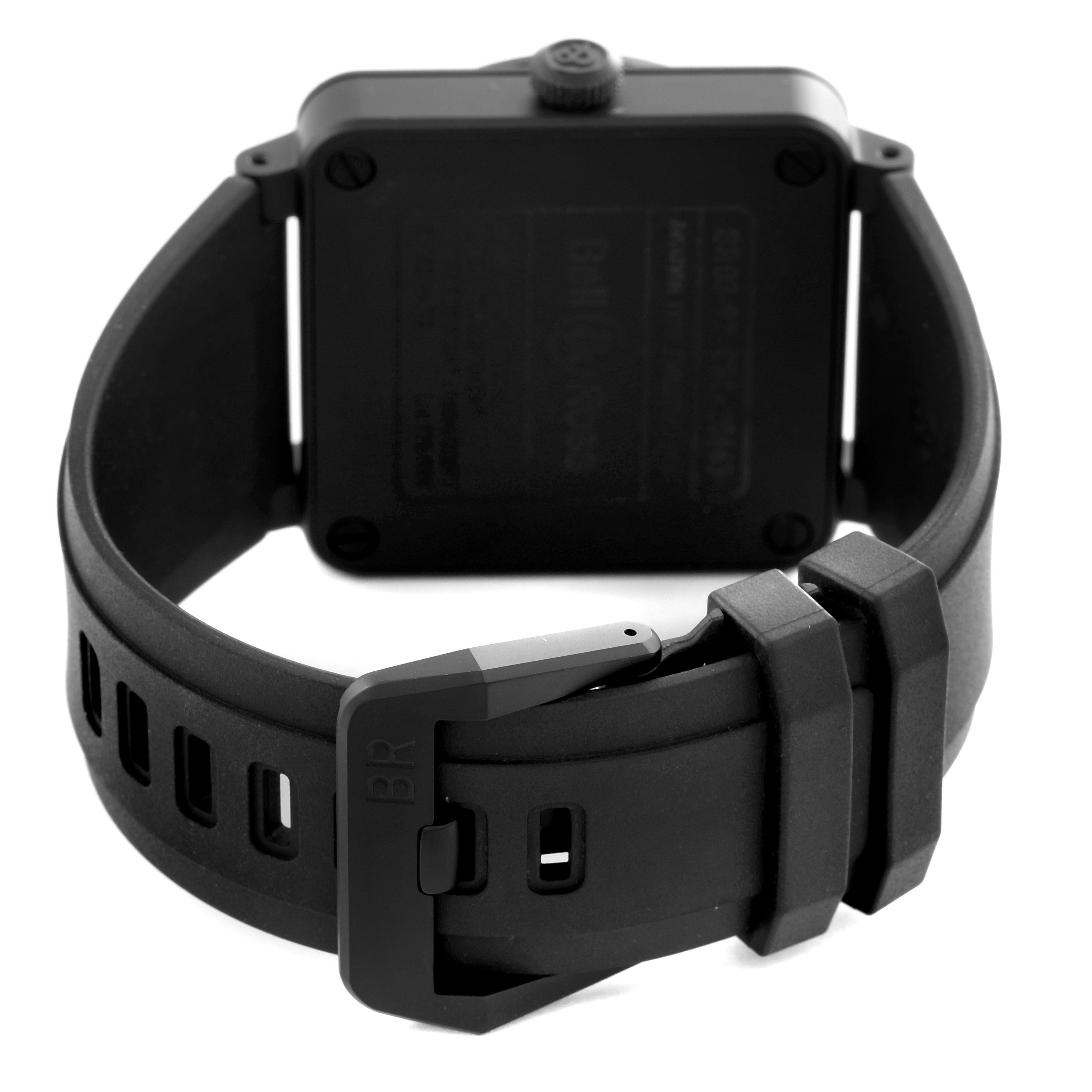 The Bell 
Ross Instruments BR0392-RRDR-CE/SRB Men
s Ceramic Black Dial BR0392-RRDR-CE/SRB Men
s Ceramic Black Dial watch is shown from the back, displaying the case back, strap, and buckle.