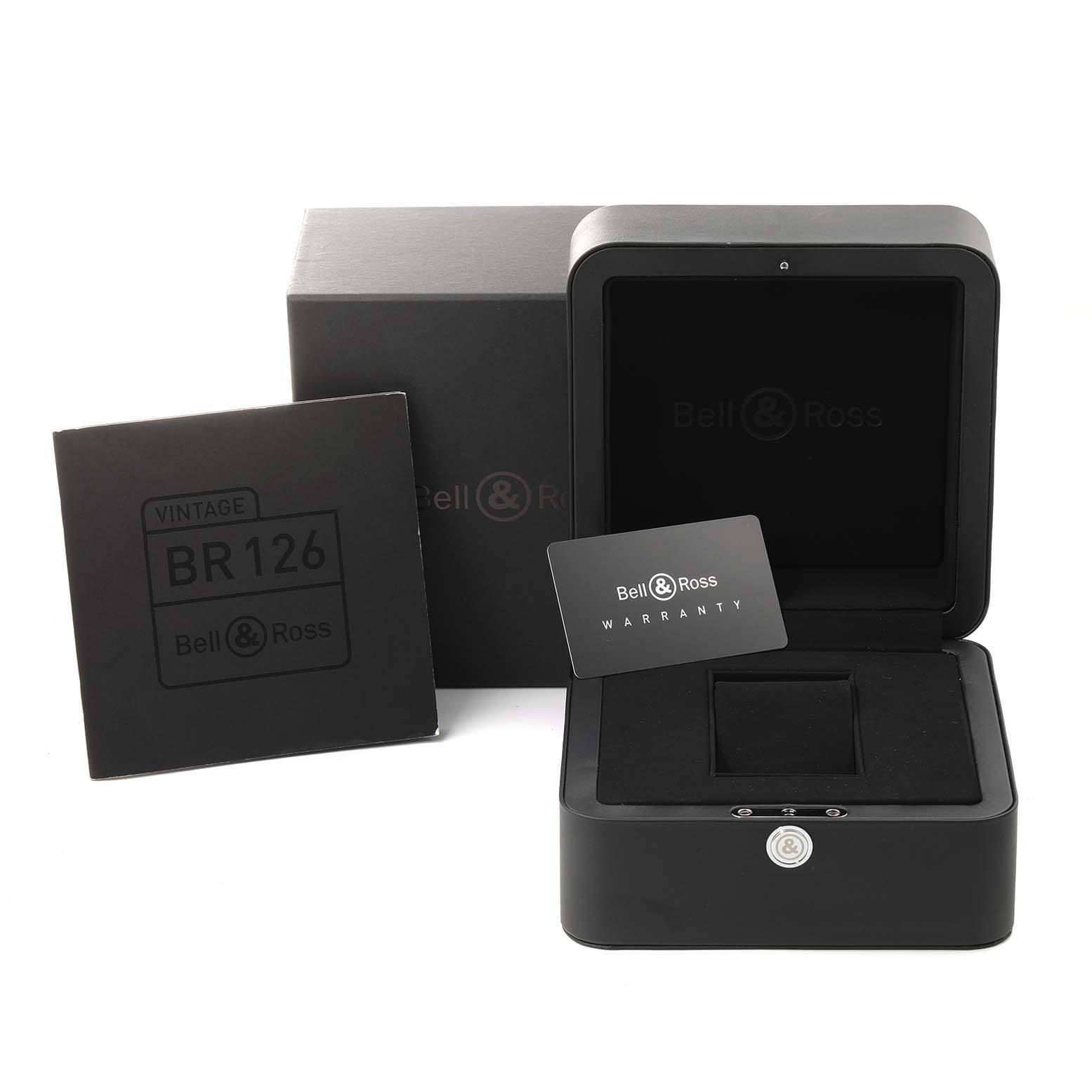 The image shows the packaging, warranty card, and box for a Bell & Ross Vintage model BR 126 watch.