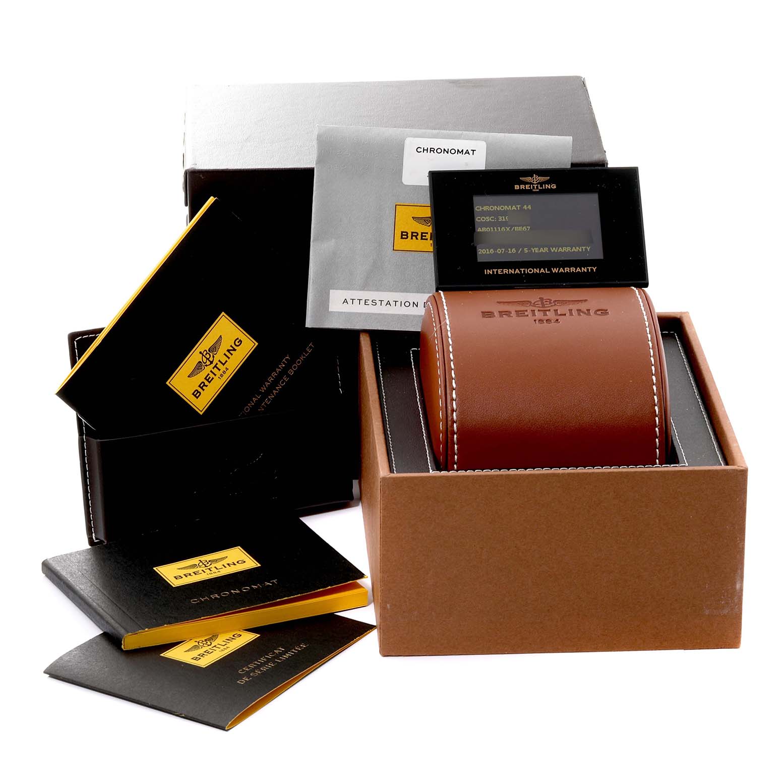 The image shows the packaging and accessories of a Breitling Chronomat AB01111A/BF68 Men's Stainless Steel Mother of Pearl Dial AB01111A/BF68 Men's Stainless Steel Mother of Pearl Dial watch, including a leather box, warranty cards, and booklets.