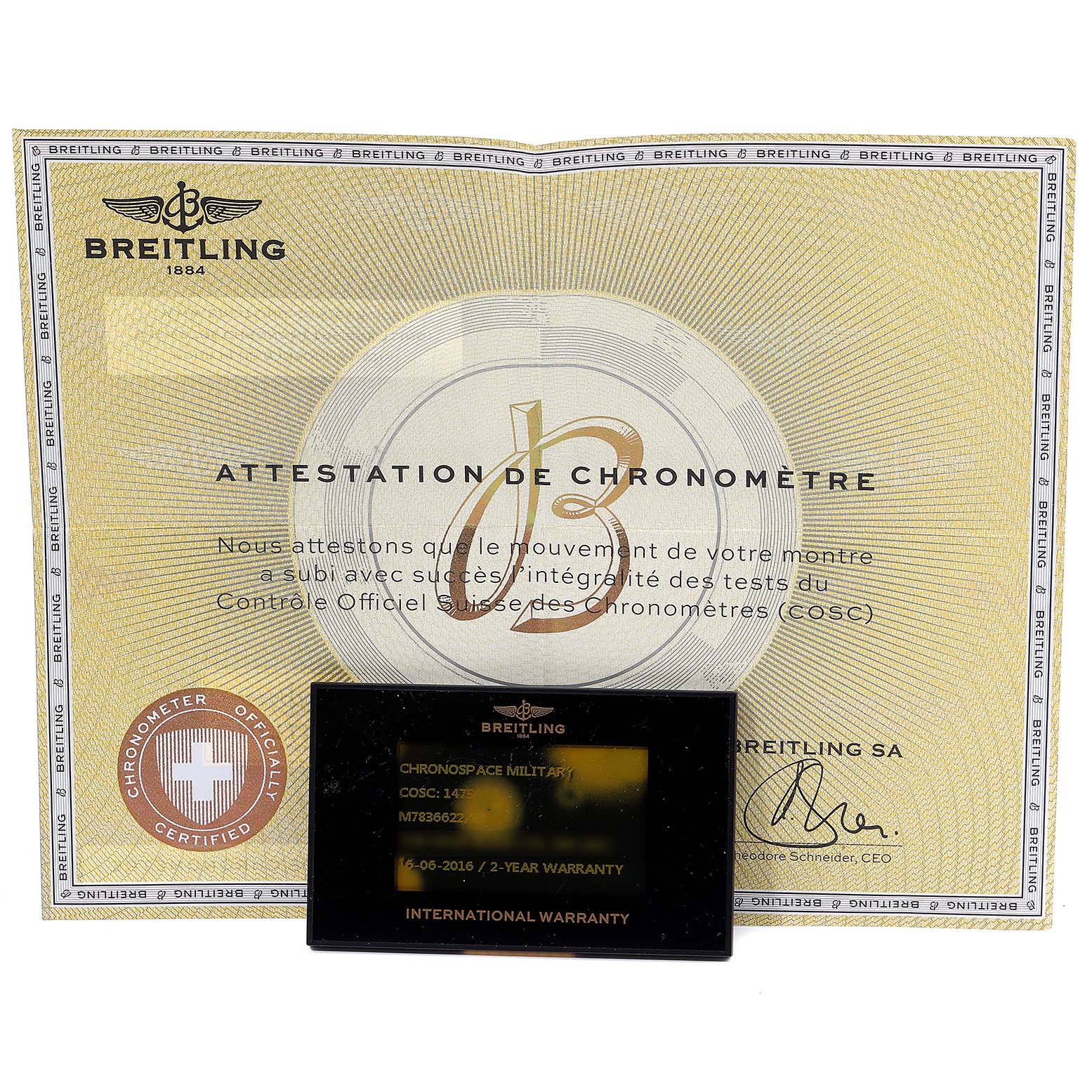The image shows the Breitling Professional Series M78366 Men's Stainless Steel Black Dial M78366 Men's Stainless Steel Black Dial warranty card and COSC certification from a front angle.