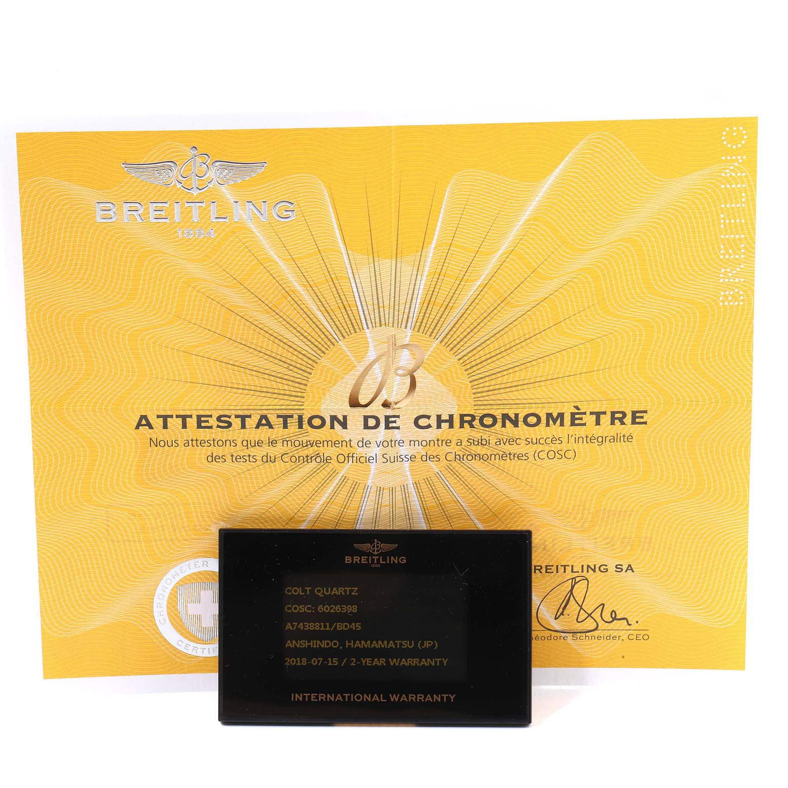 The image shows a Breitling Colt A74388 Men's Stainless Steel Black Dial A74388 Men's Stainless Steel Black Dial model's chronometer attestation and international warranty card.