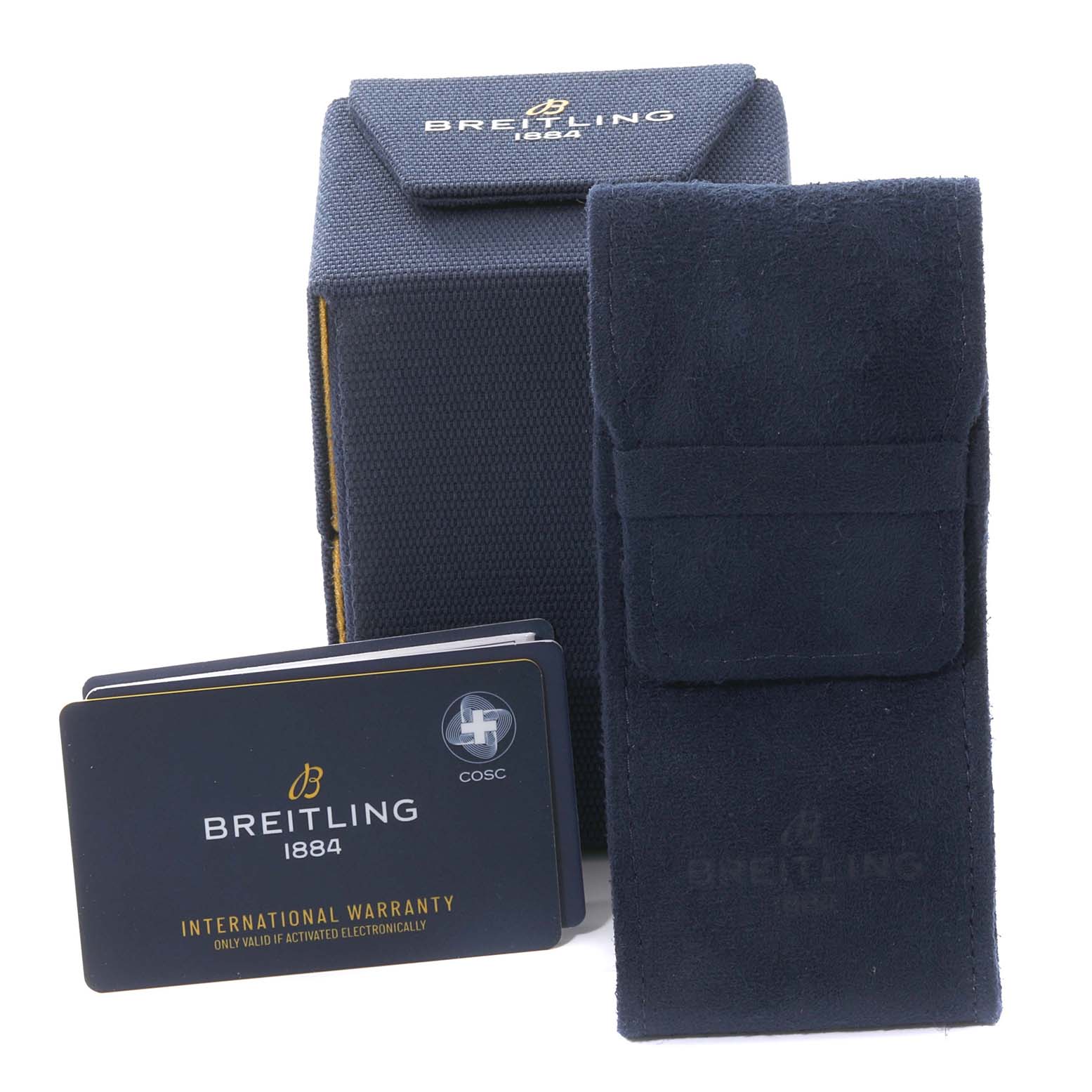 This image shows the packaging and accessories of a Breitling Navitimer AB0138 Men's Stainless Steel Black Dial AB0138 Men's Stainless Steel Black Dial watch, including the case, a soft pouch, and warranty cards.