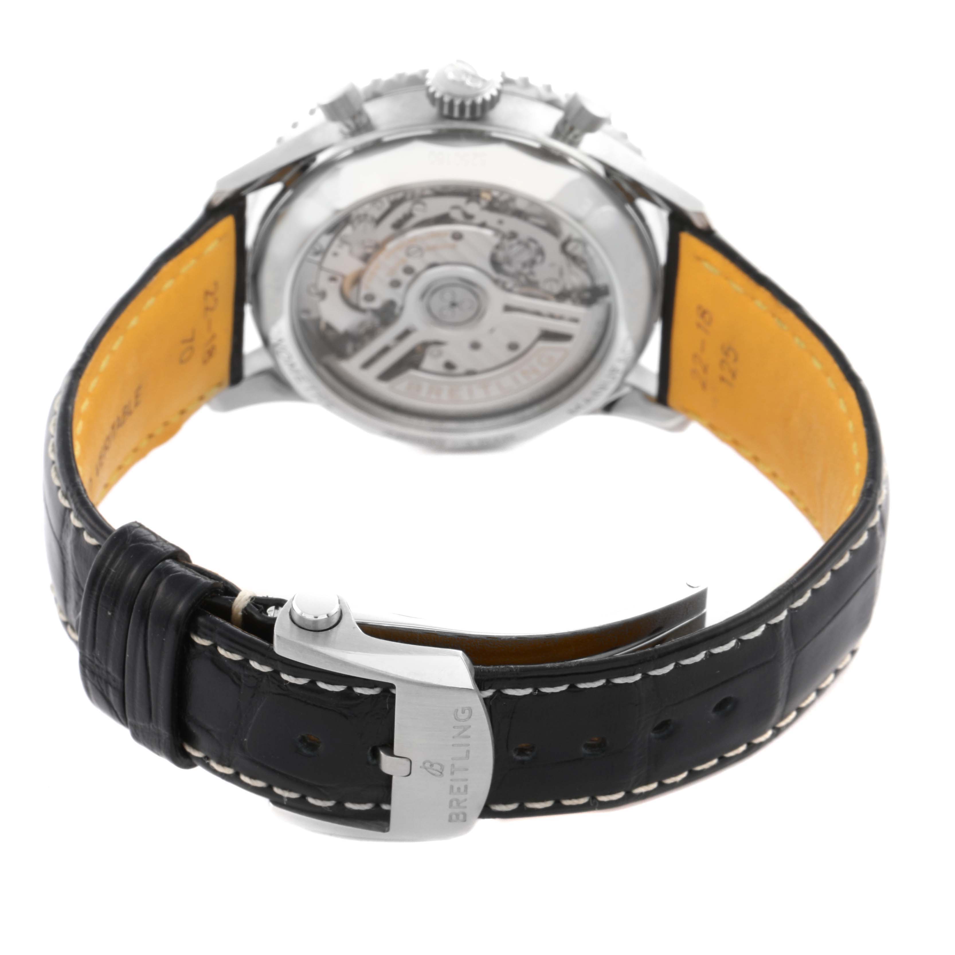 The watch is a Breitling Navitimer AB0139241C1P1 Men
s Stainless Steel Blue Dial AB0139241C1P1 Men
s Stainless Steel Blue Dial viewed from a rear angle, showcasing the transparent case back and leather strap.