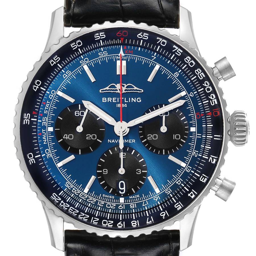 The Breitling Navitimer watch is shown from a front angle, highlighting the dial, chronograph sub-dials, bezel, and crown.
