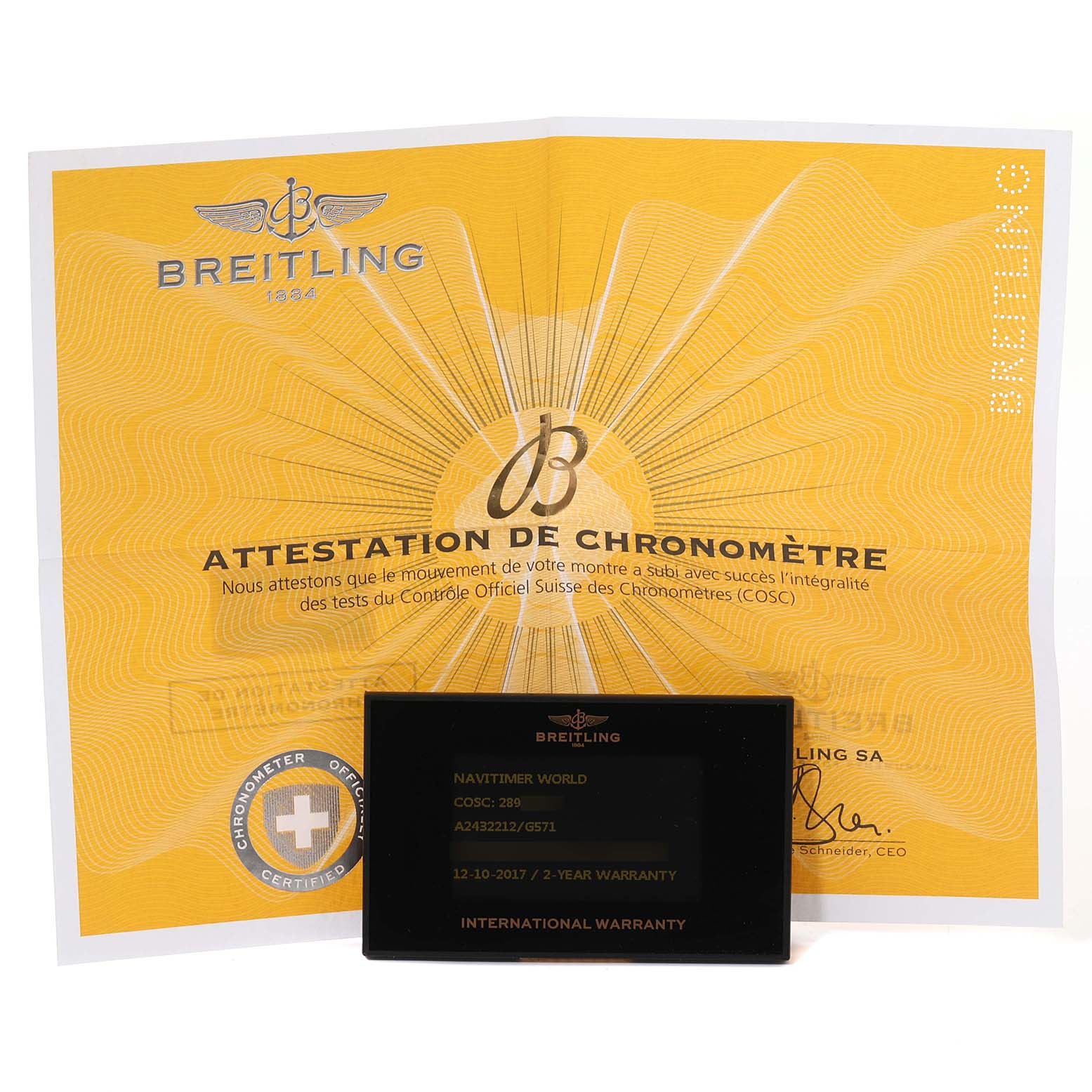 The image shows the warranty card and certificate for the Breitling Navitimer A24322 Men's Stainless Steel Silver Dial A24322 Men's Stainless Steel Silver Dial watch.