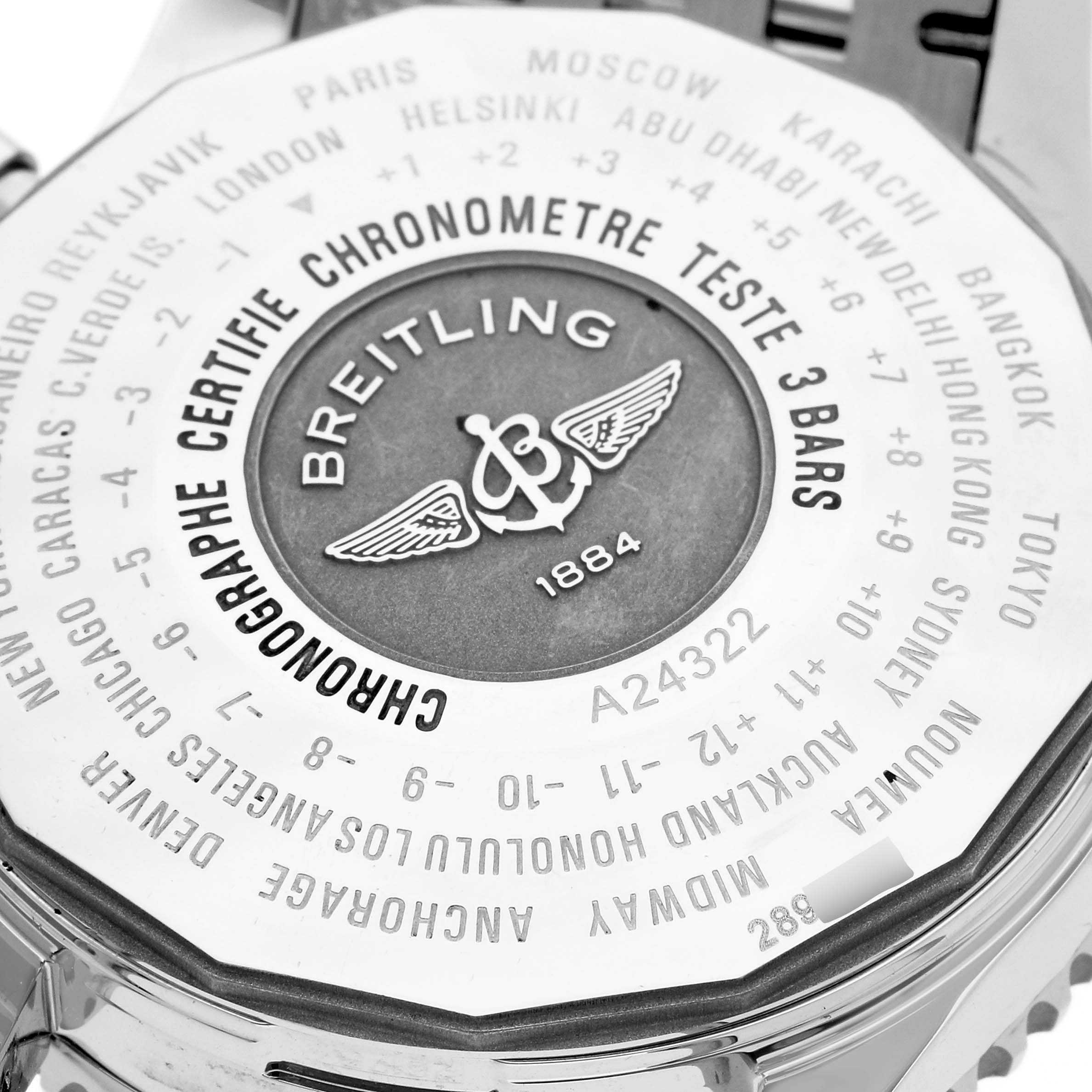 This image shows the back case of a Breitling Navitimer A24322 Men's Stainless Steel Silver Dial A24322 Men's Stainless Steel Silver Dial watch, highlighting the engraved details and city time zone markers.
