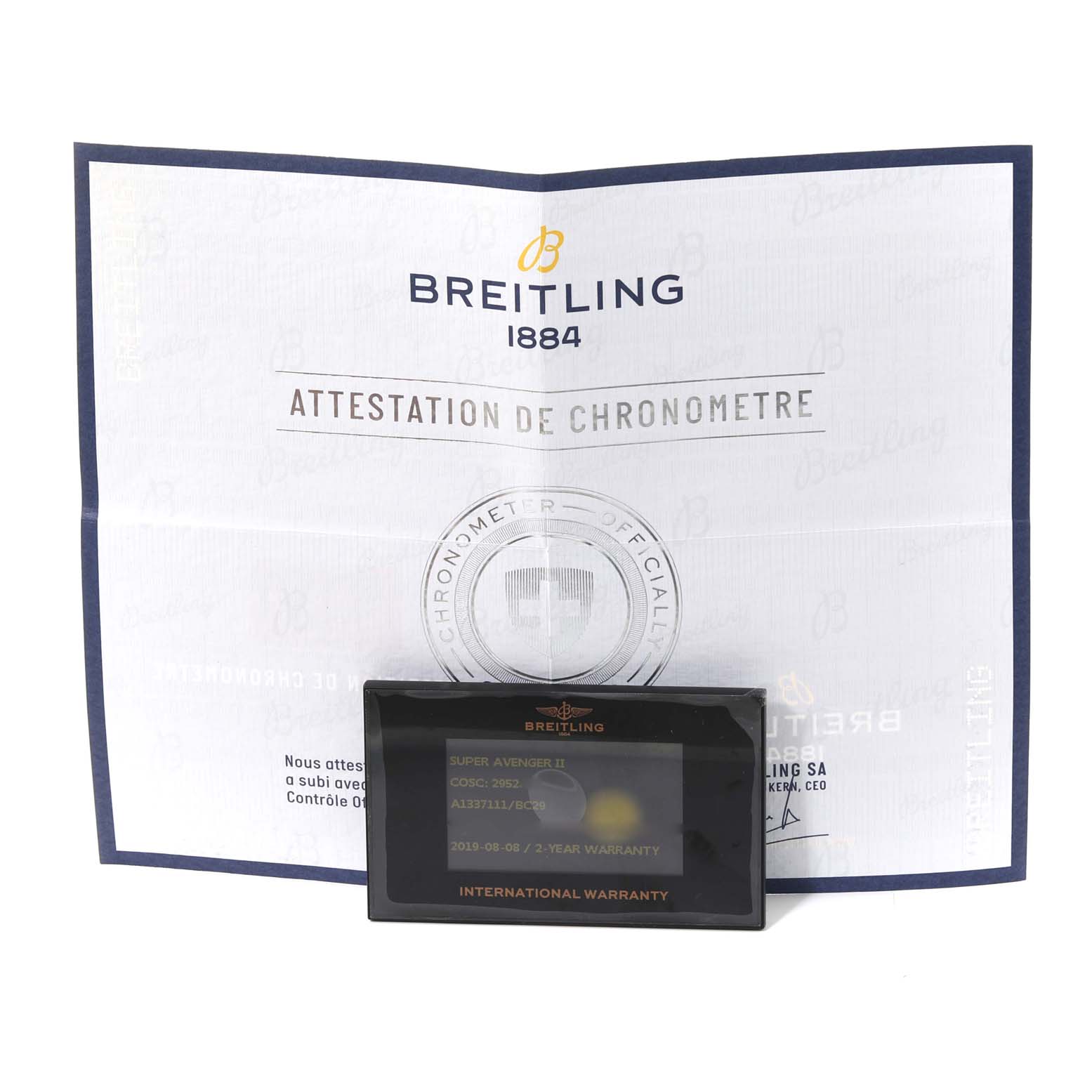The image shows the international warranty card and chronometer certification for the Breitling Avenger A13371 Men's Stainless Steel Black Dial A13371 Men's Stainless Steel Black Dial model.