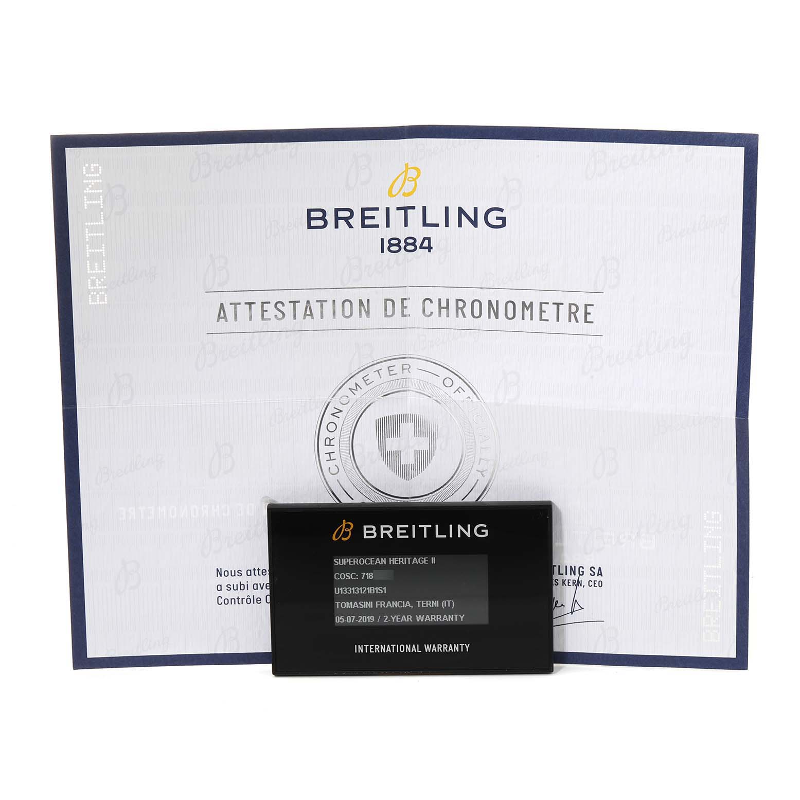 The image shows the certificate and the warranty card for a Breitling Superocean U1331312/BG50/279S/A20D.4 Men
s Steel and Gold (two tone) Black Dial U1331312/BG50/279S/A20D.4 Men
s Steel and Gold (two tone) Black Dial model watch.