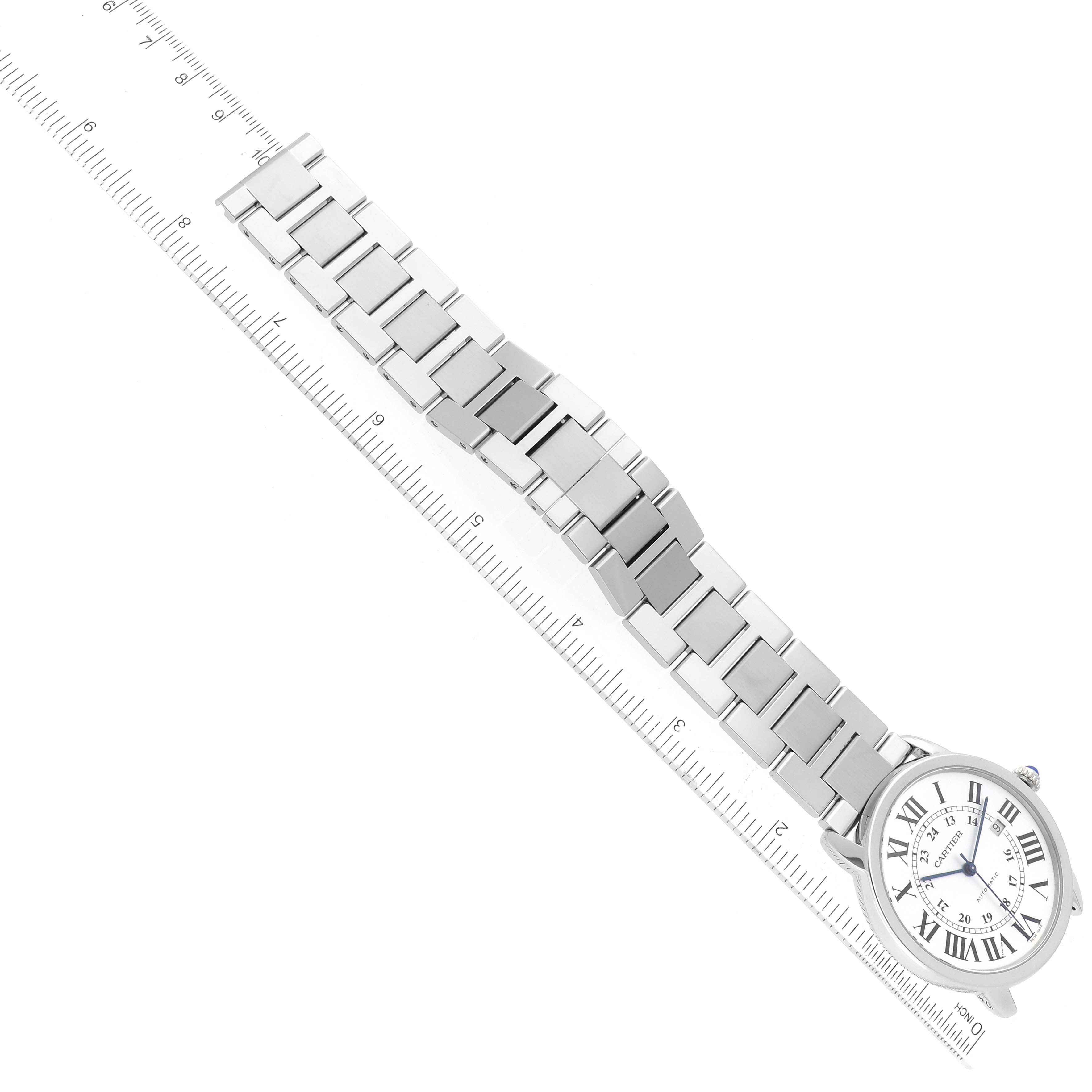 The image shows an overhead view of the Ronde model by Cartier, highlighting the face, bezel, and metal bracelet.