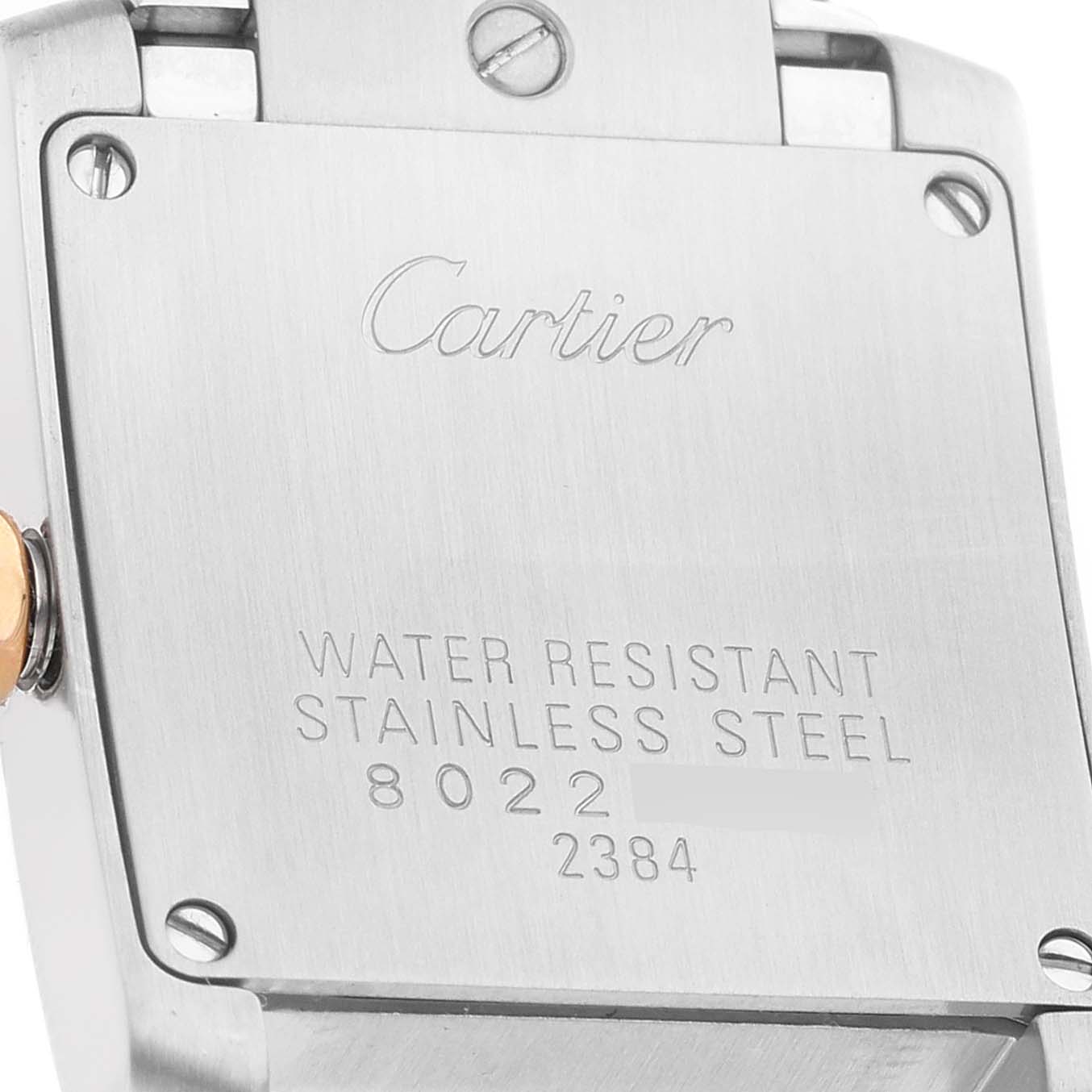 The image shows the back plate of a Cartier Tank Francaise W51027Q4 Women's Steel and Gold (two tone) Mother of Pearl Dial watch, highlighting its water resistance and stainless steel material.