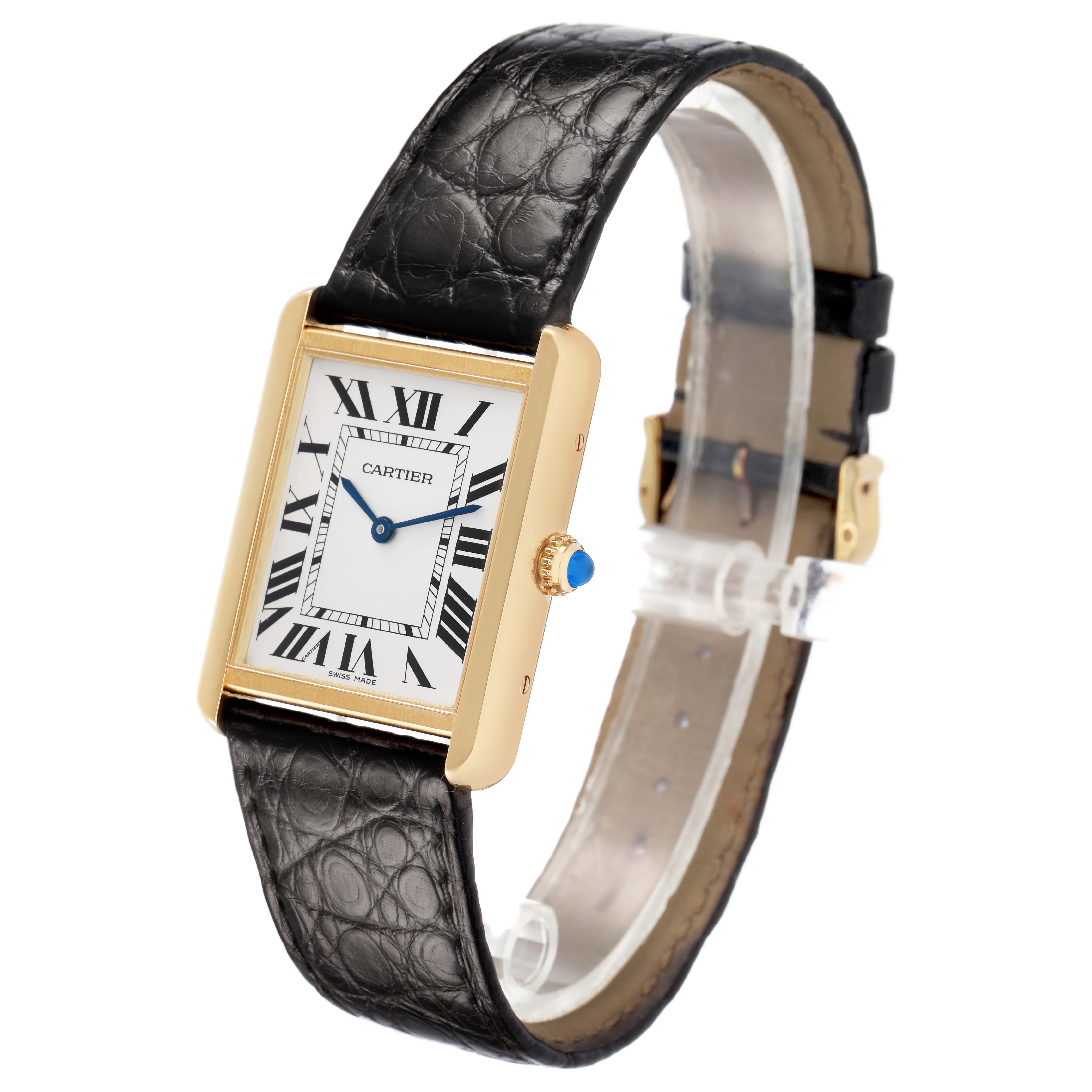 The Cartier Tank Solo W5200025 Men's Yellow Gold Silver Dial watch is shown from a three-quarter angle, displaying its face, leather strap, and blue cabochon crown.