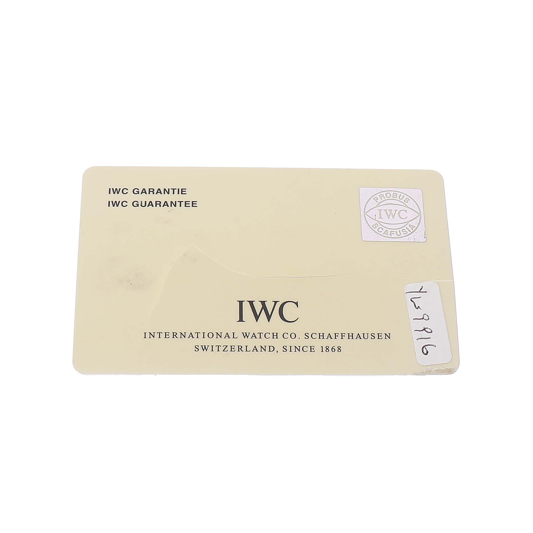 This image shows an IWC Pilot IW371705 Men's Stainless Steel Silver Dial warranty card with brand details and a serial number.