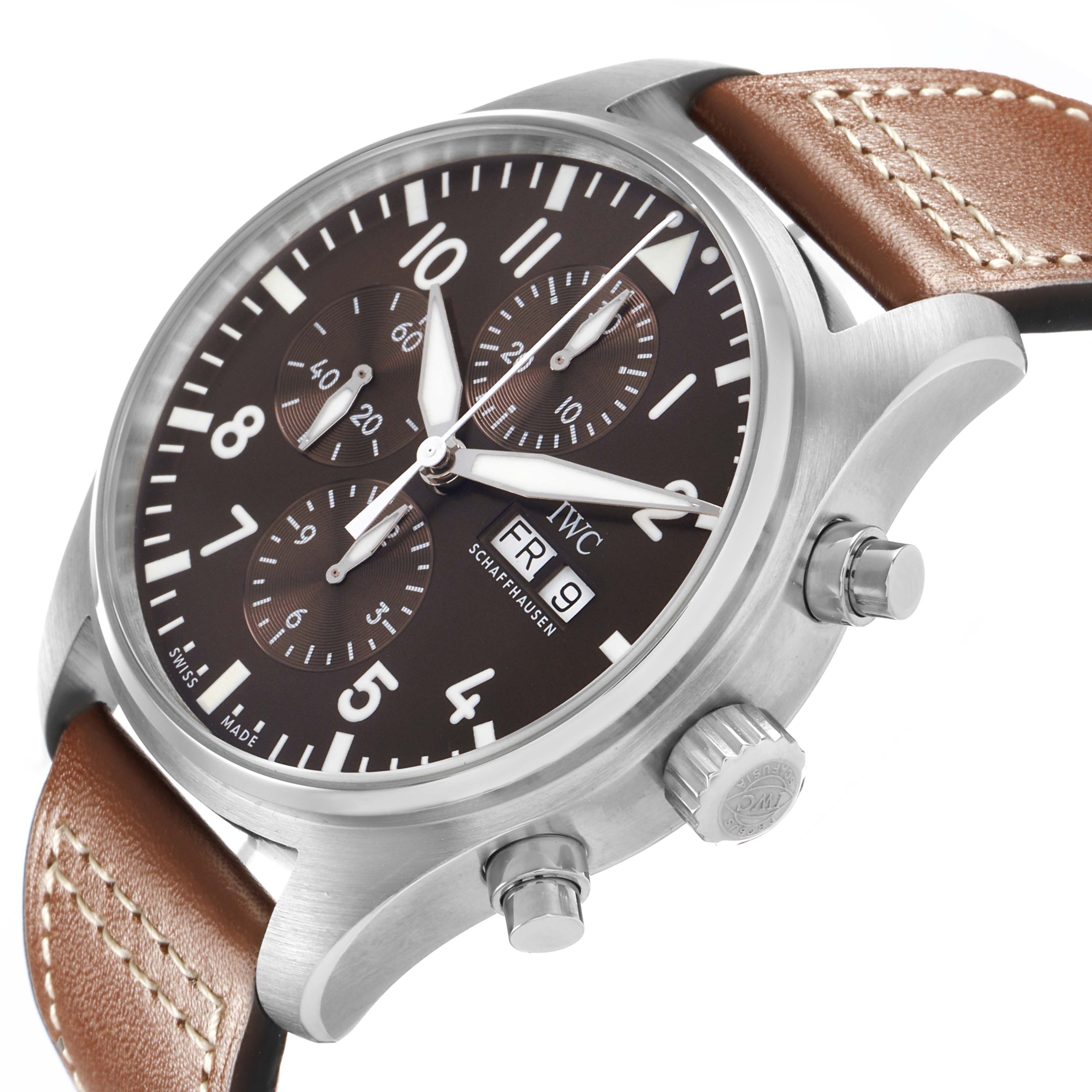 The IWC Pilot IW377713 Men's Stainless Steel Brown Dial watch is shown at an angled view, highlighting the face, side buttons, crown, and brown leather strap.
