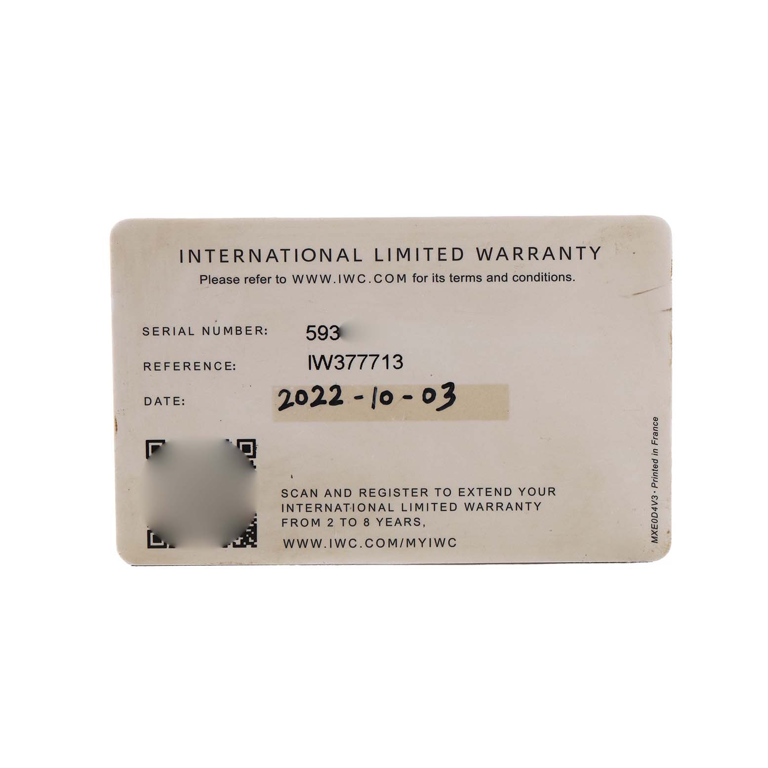 The image shows an IWC Pilot IW377713 Men's Stainless Steel Brown Dial model's International Limited Warranty card, displaying the serial and reference numbers.