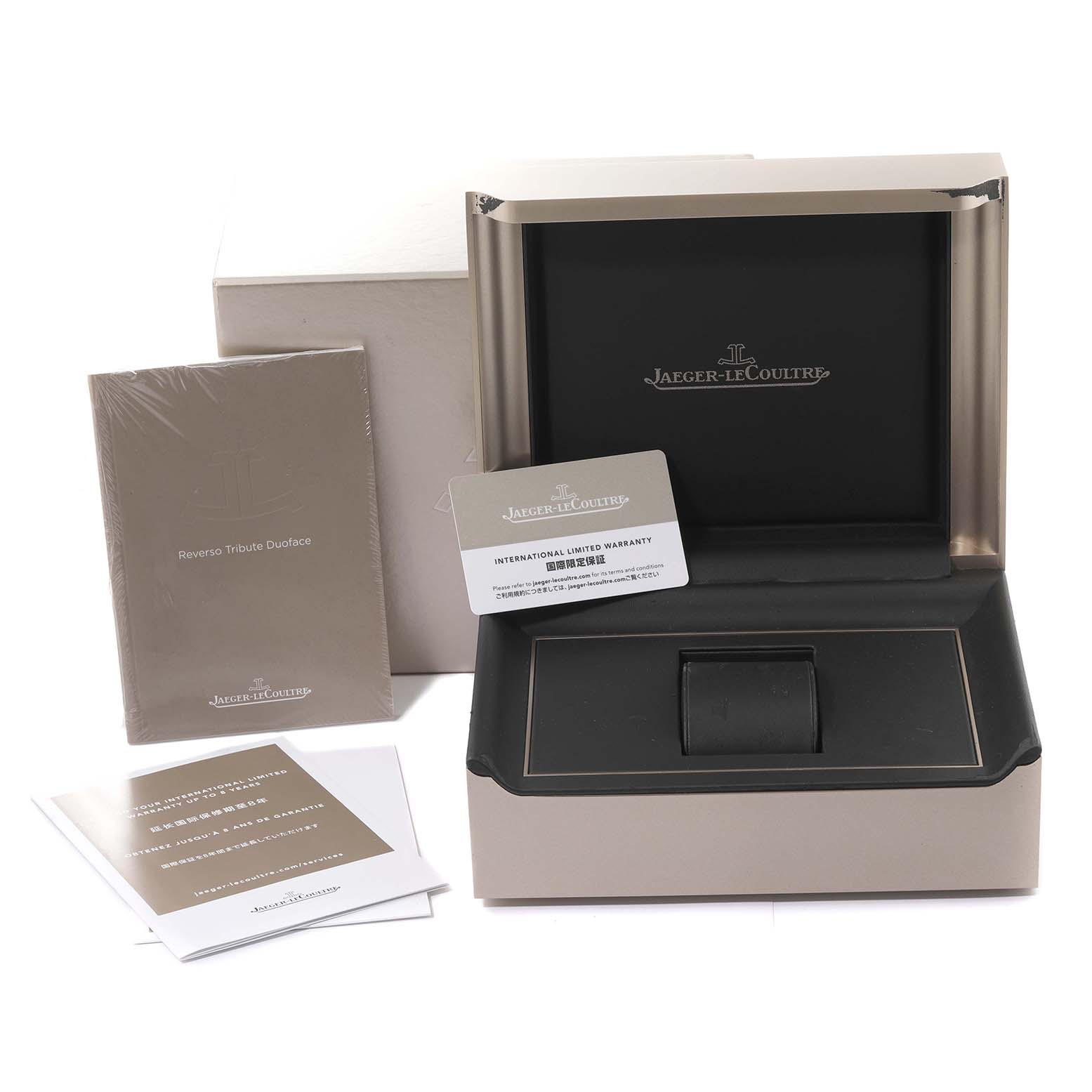 The Jaeger LeCoultre Reverso Q3988482 Men's Stainless Steel Blue Dial Q3988482 Men's Stainless Steel Blue Dial watch accessories include the box, warranty card, manuals, and outer packaging, shown from a frontal angle.