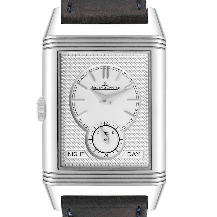 The Jaeger-LeCoultre Reverso watch is shown from the front, highlighting its dial, subdial, and night/day indicators.